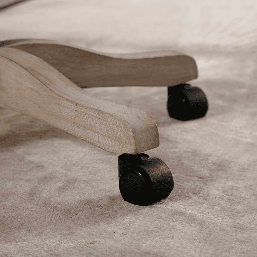 Wheeled chair base close-up