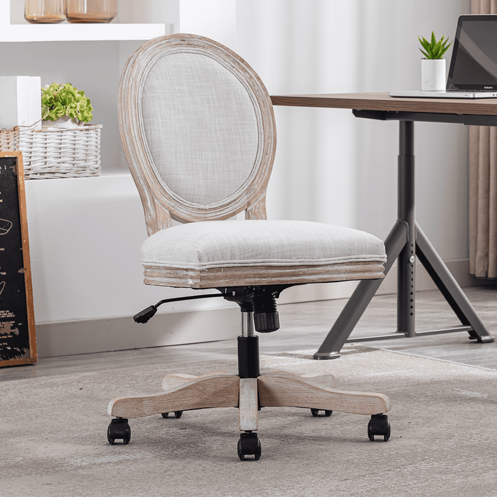Chair placed at desk in a bright room