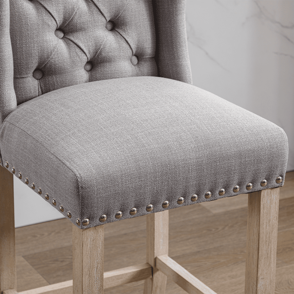 Close-up of upholstery texture and nailheads