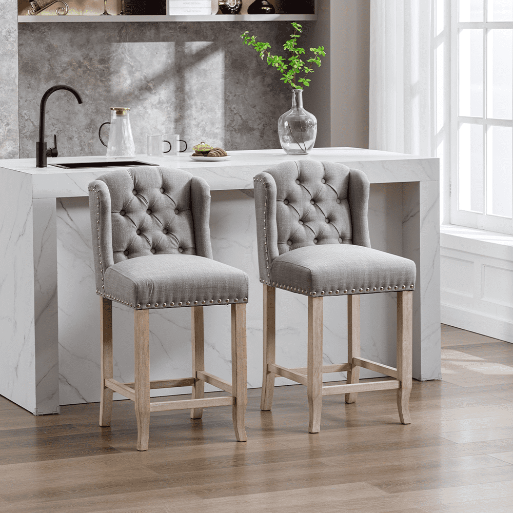 Two stools at kitchen island with breakfast items