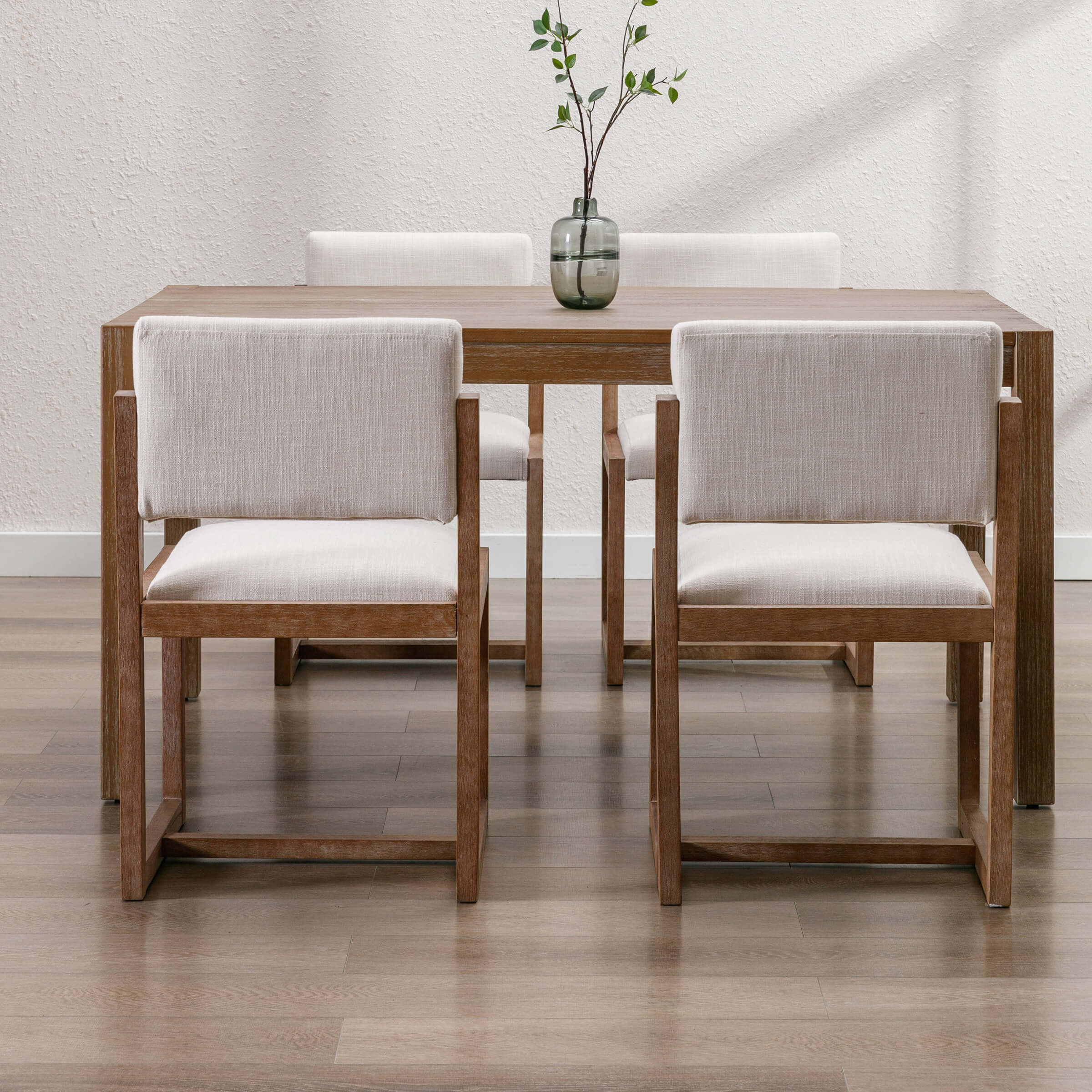 Dining table with four chairs in a dining room