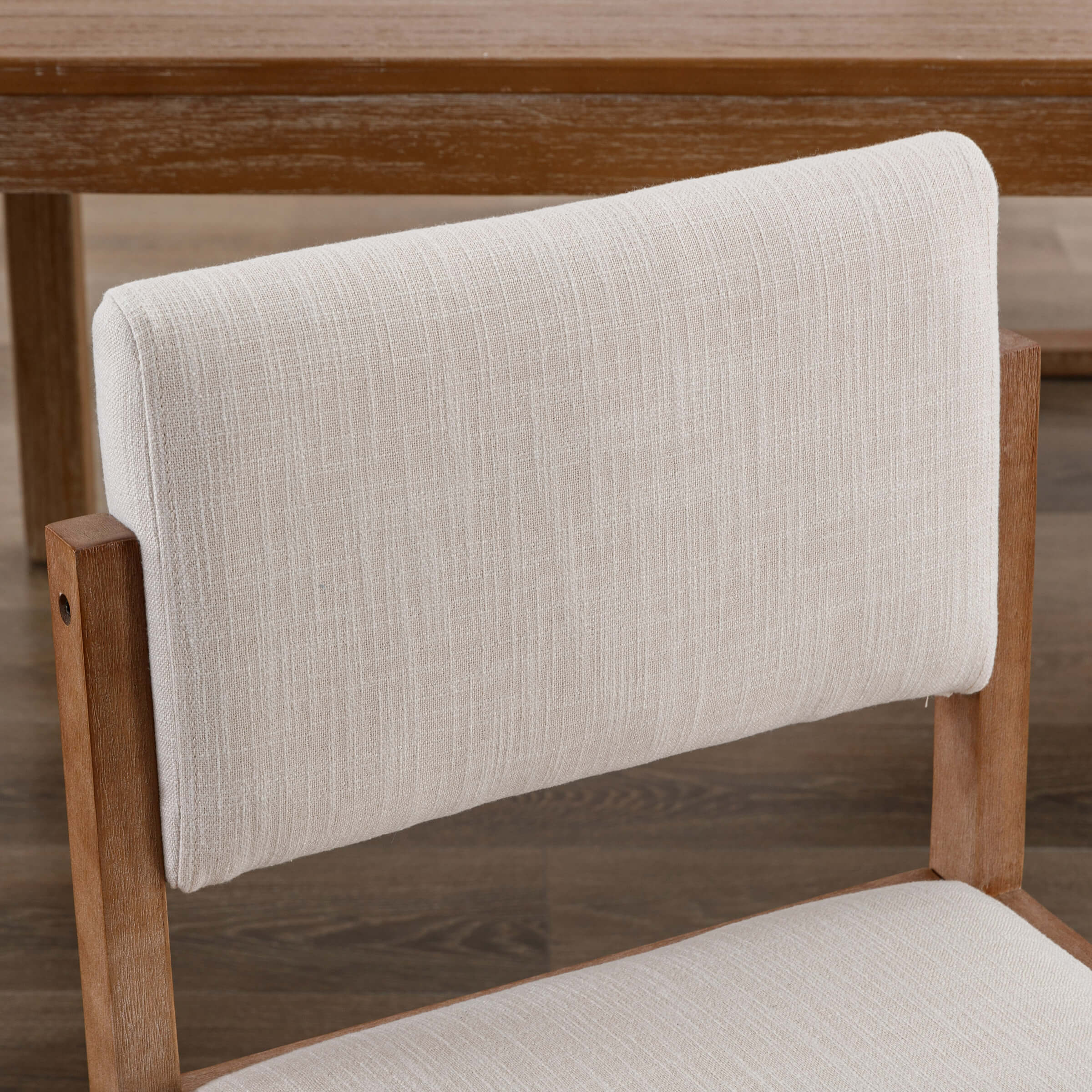 Close-up of chair backrest and wooden frame