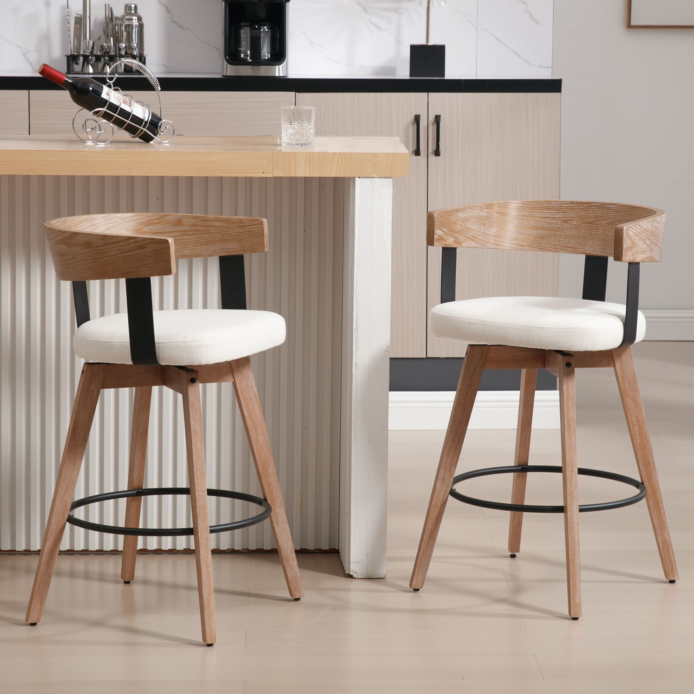 Two counter height stools at a kitchen island