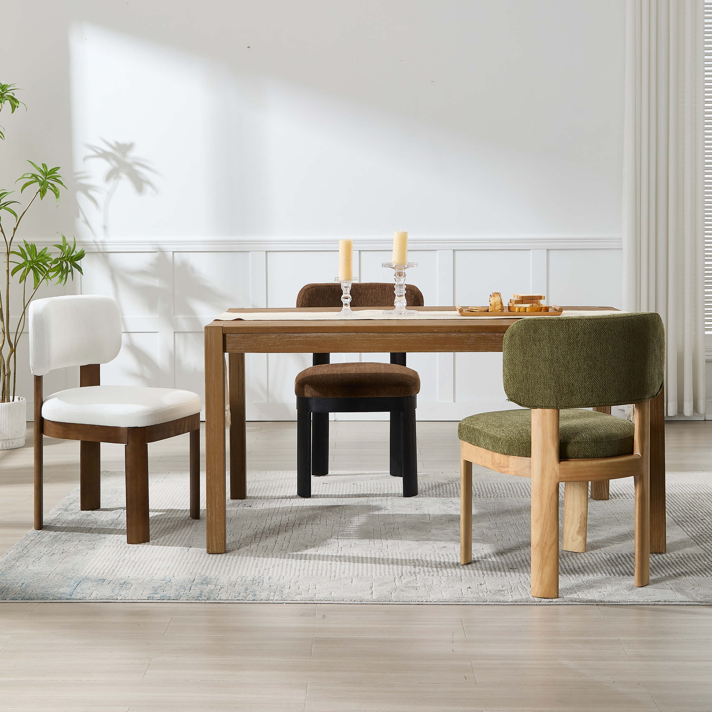 Dining set with three chairs around table