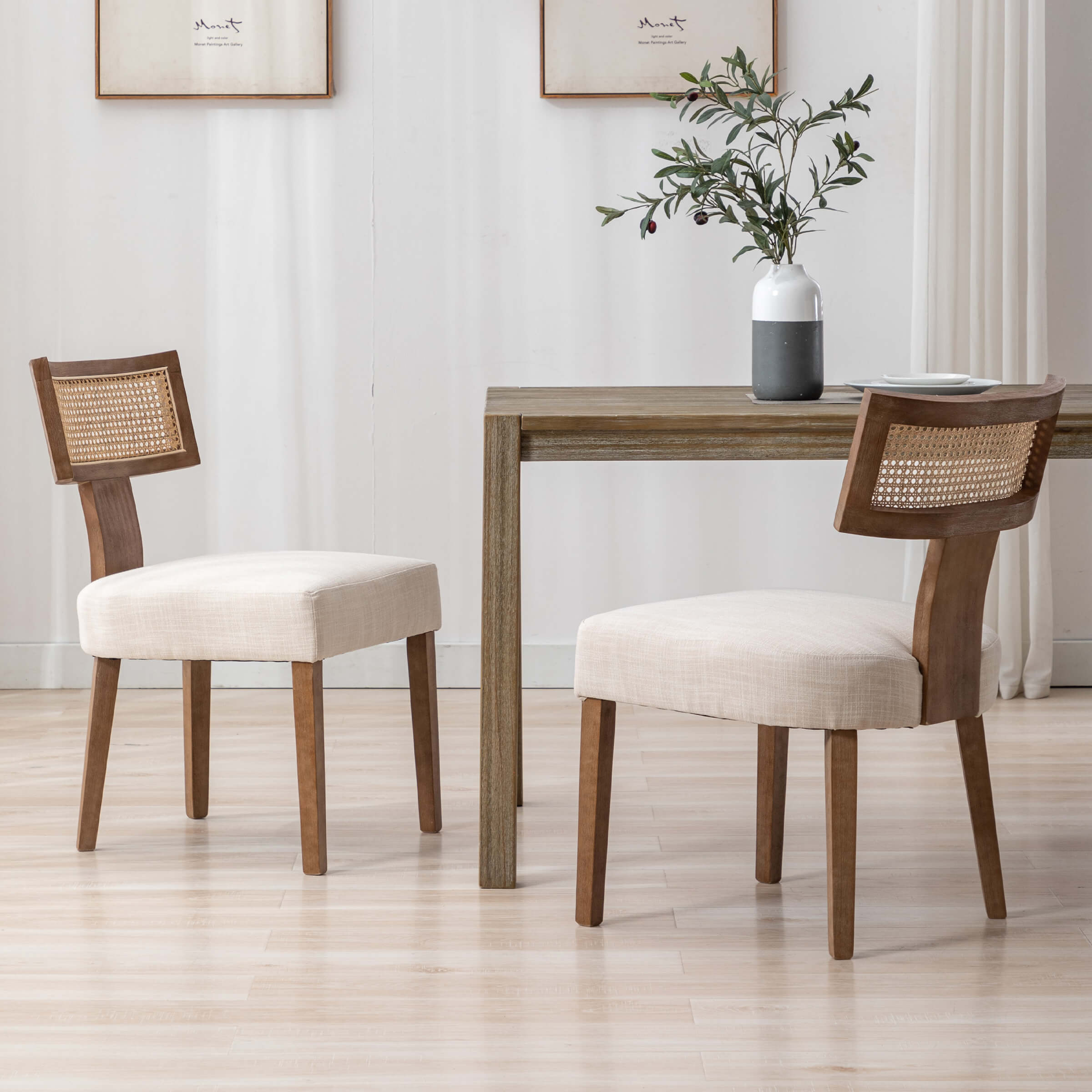 Dining chairs with table and vase on table