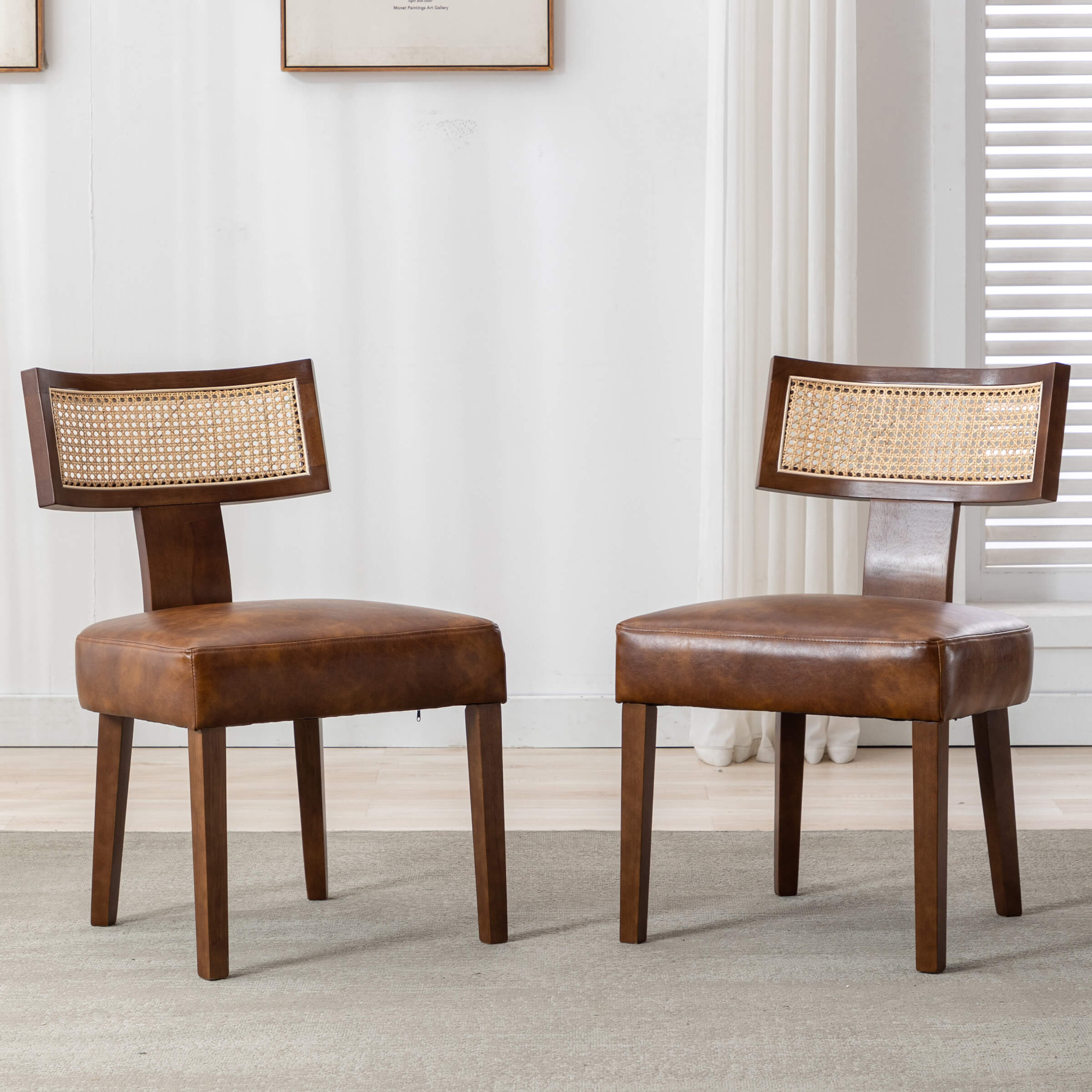 Pair of swivel-like chairs with cane backs