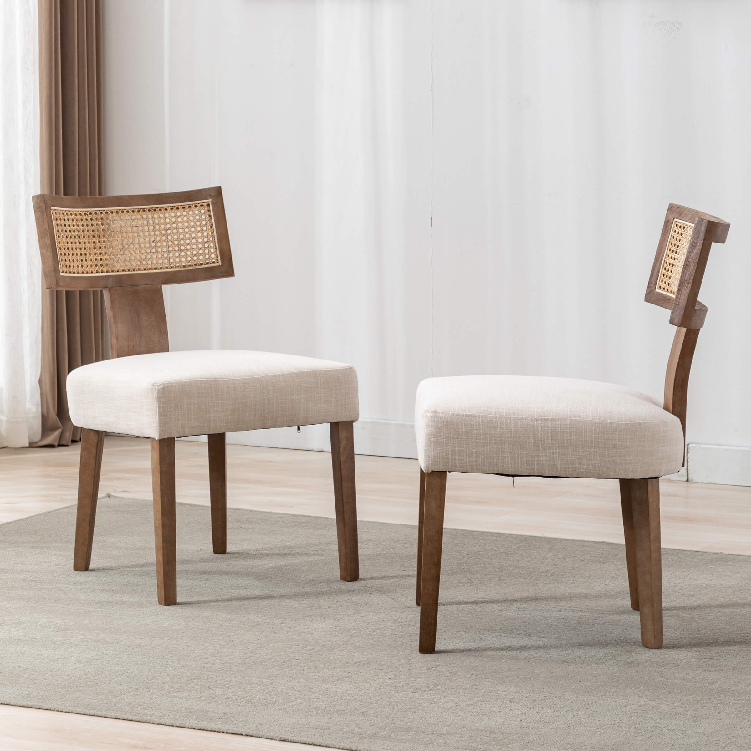 Side view of two dining chairs around a table in a dining setup