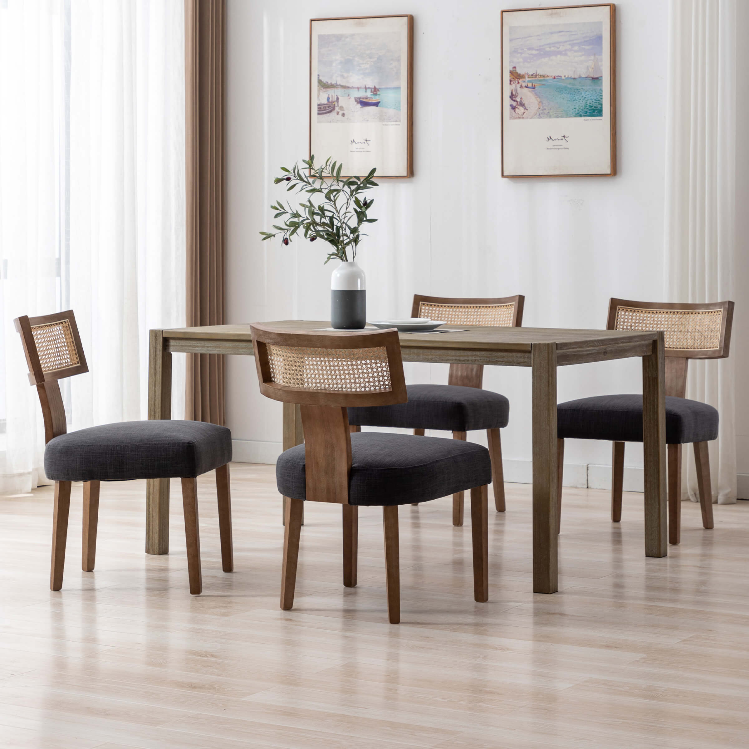 Glossy black chairs around table