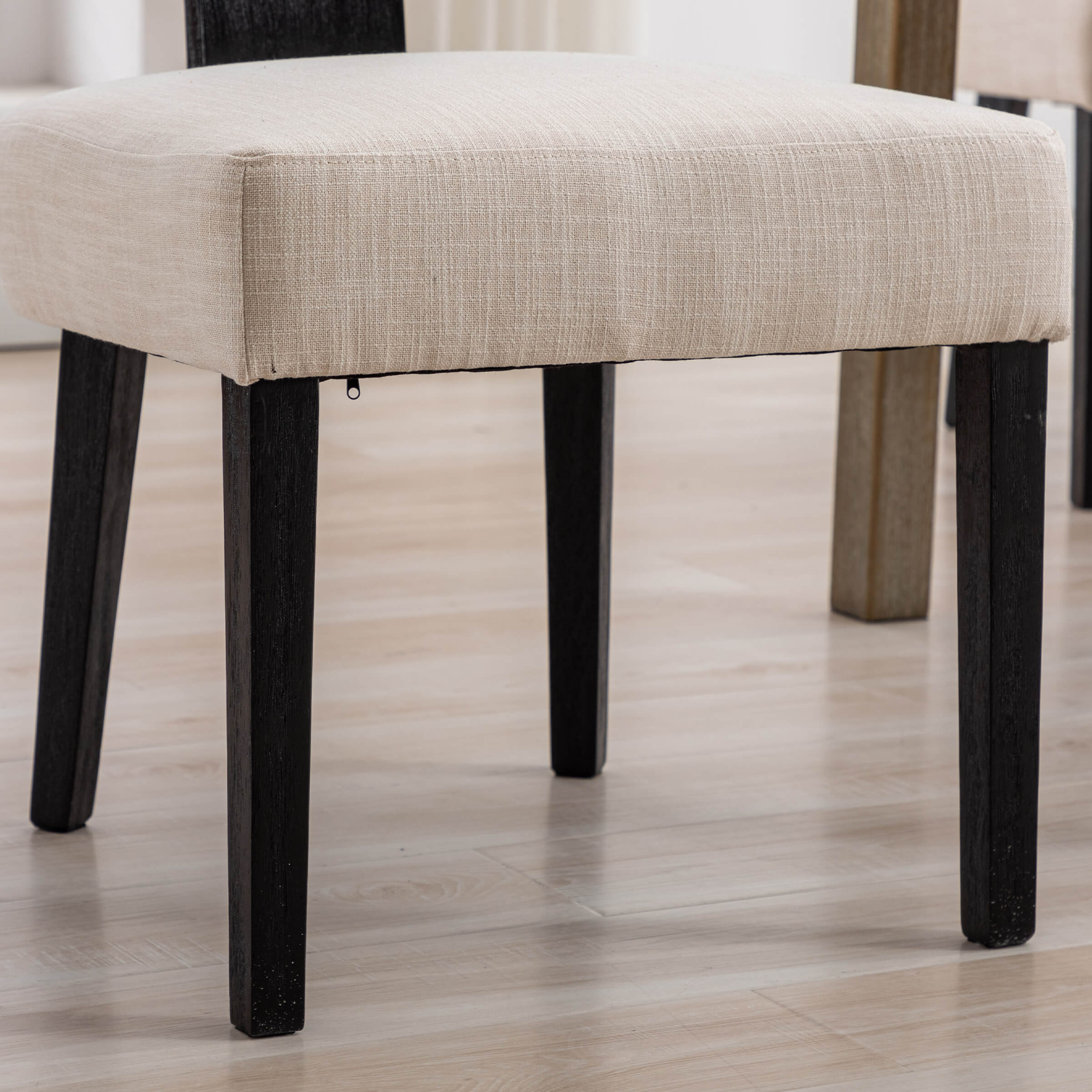 Corner of chair leg with fabric