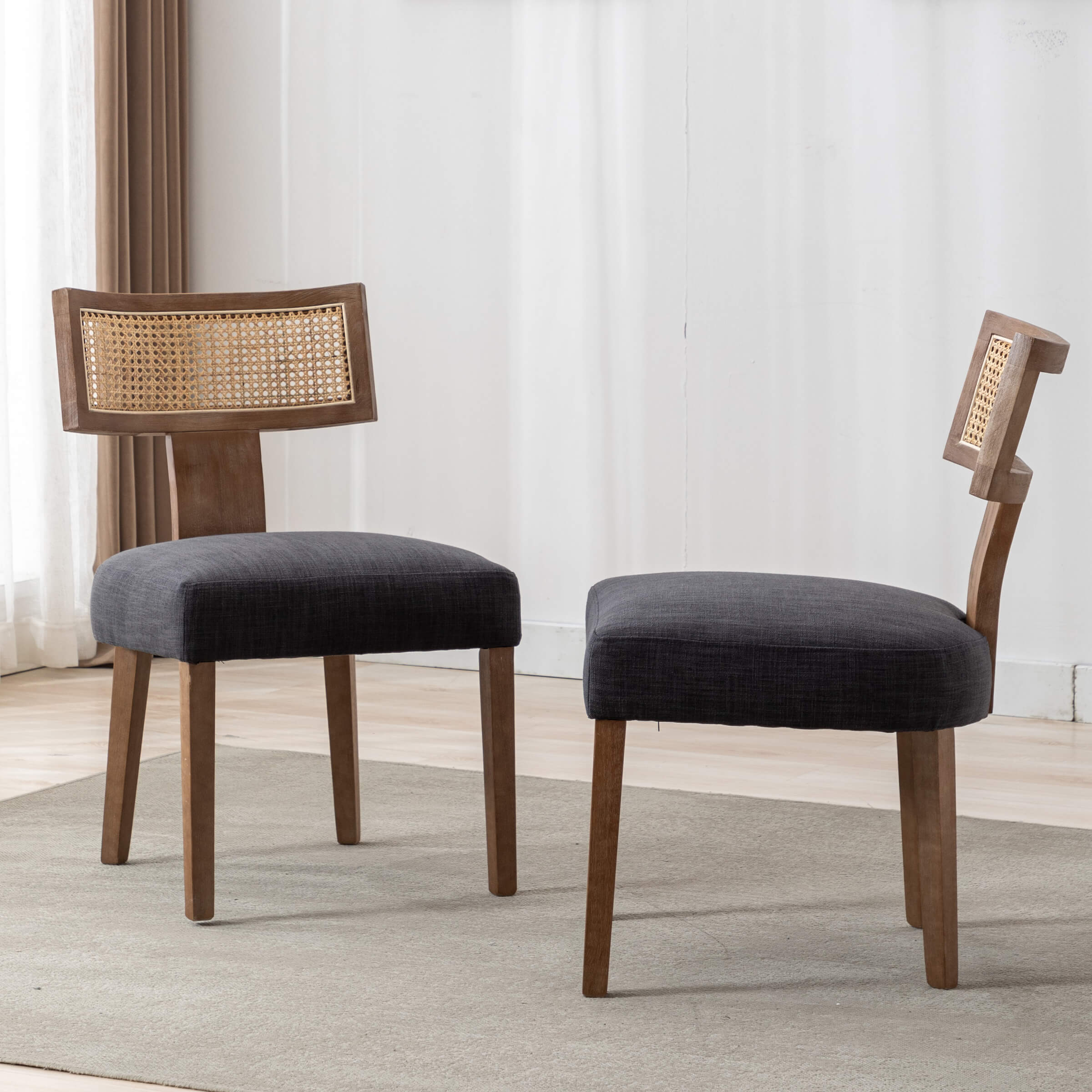 Two chairs with caned back in black