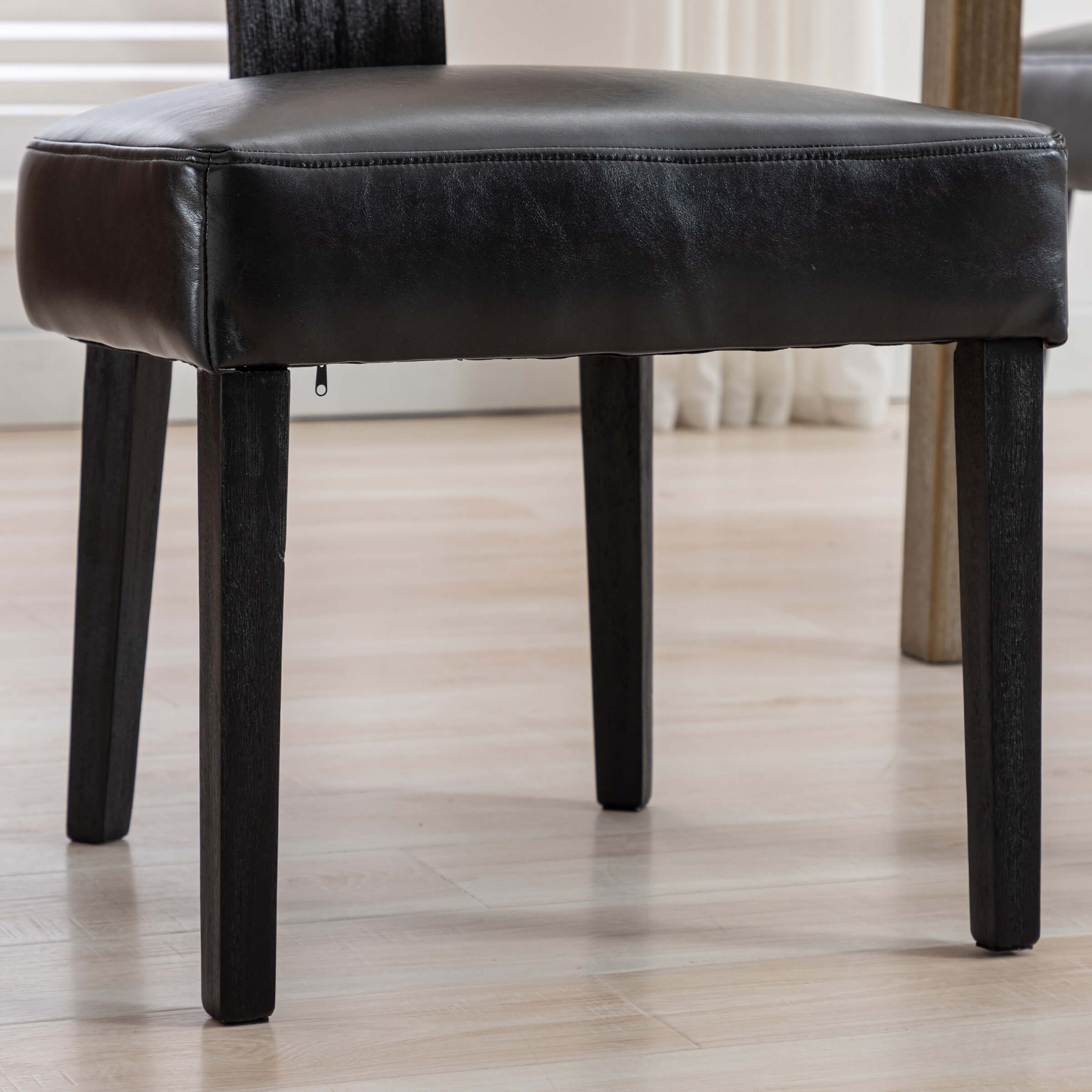 Edge of leather seat and leg
