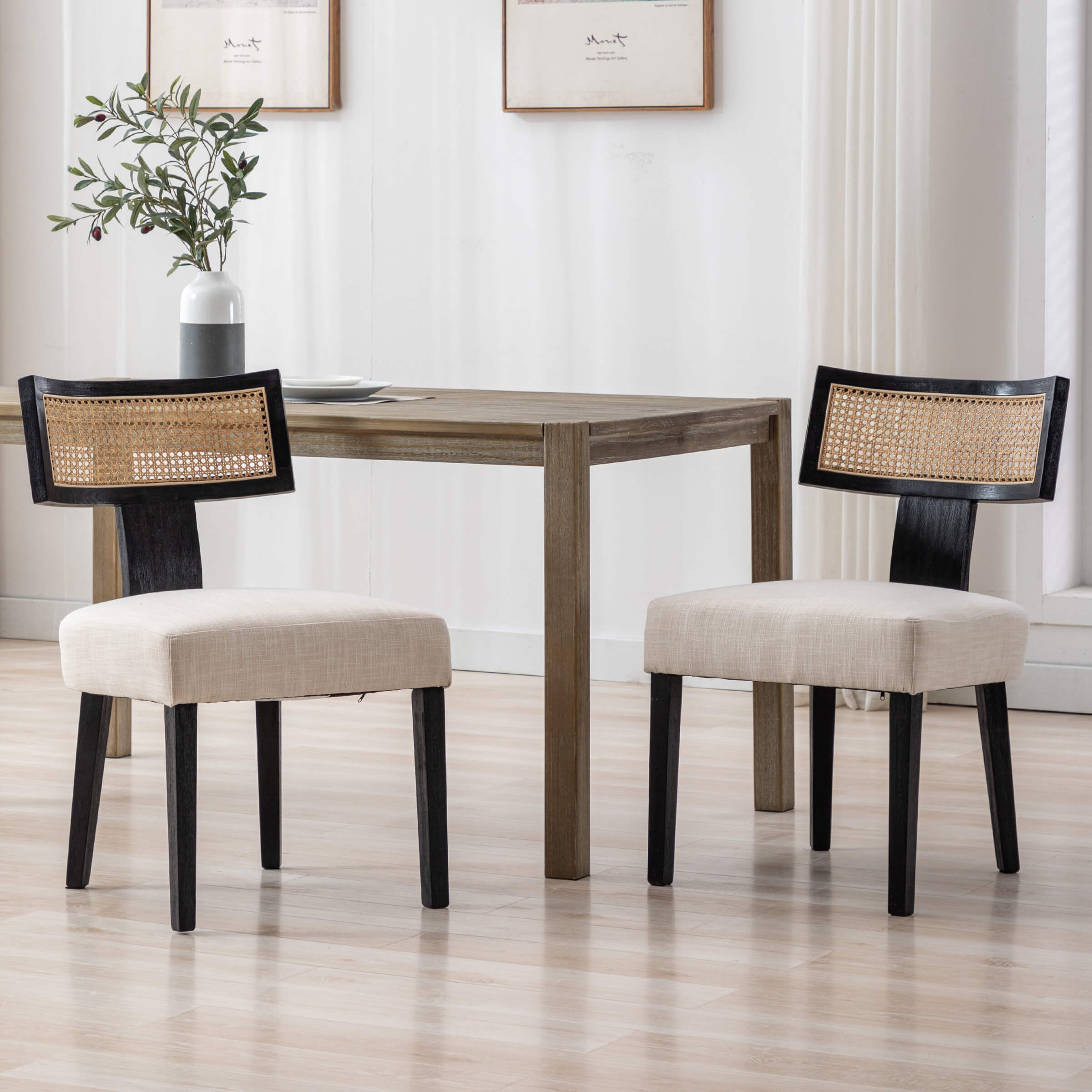 Table with two chairs with black legs