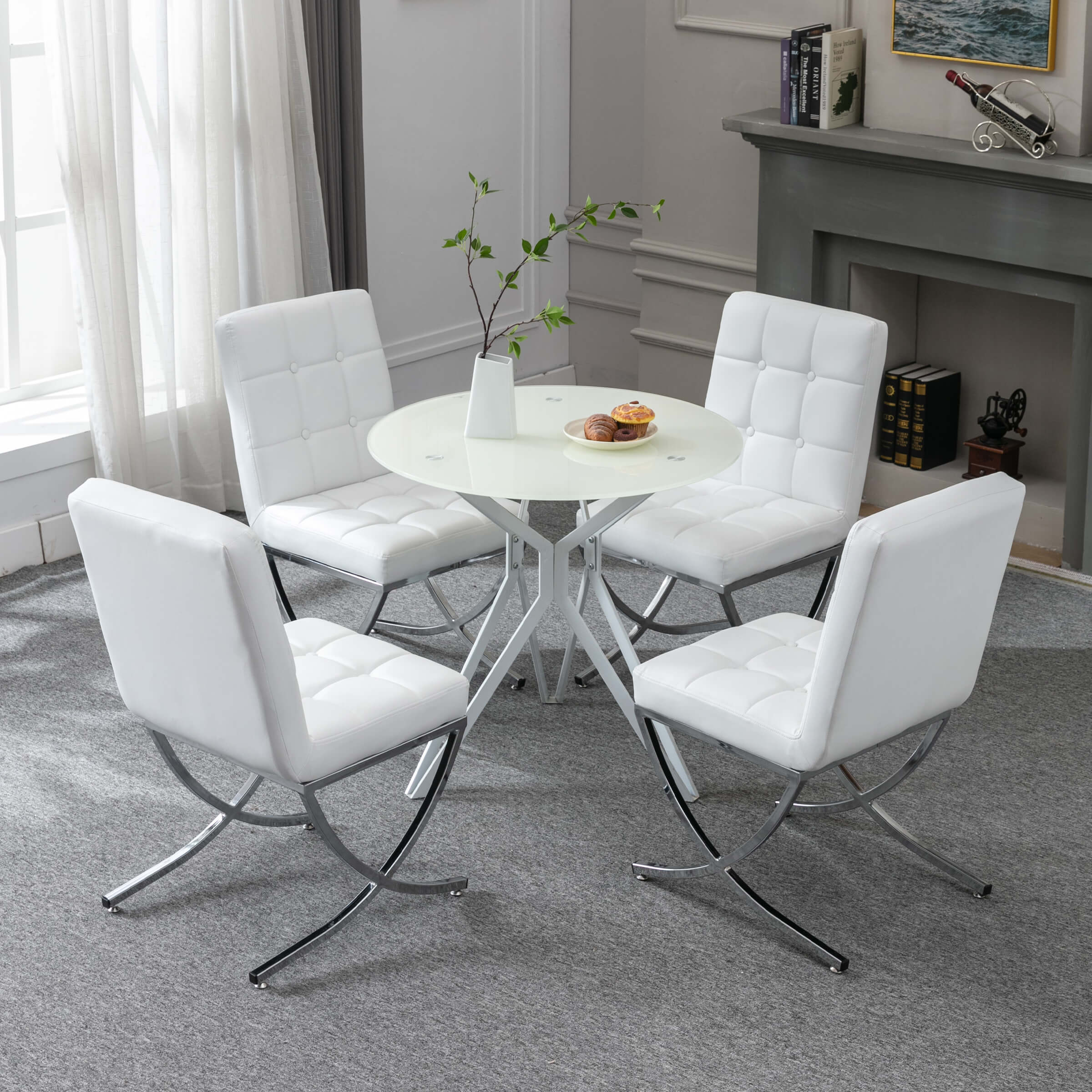 Dining chairs around round glass table in living room