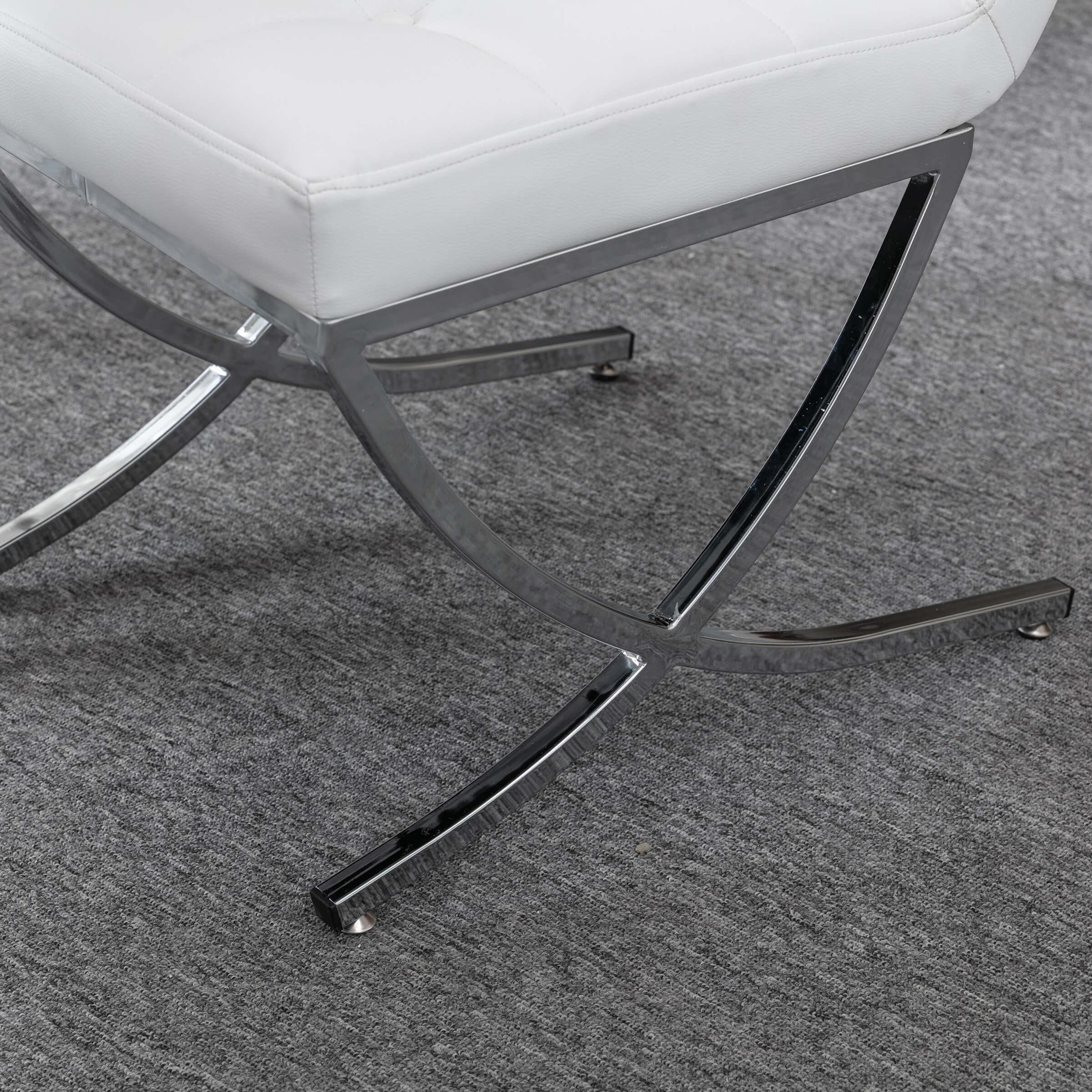 Chrome metal leg close-up