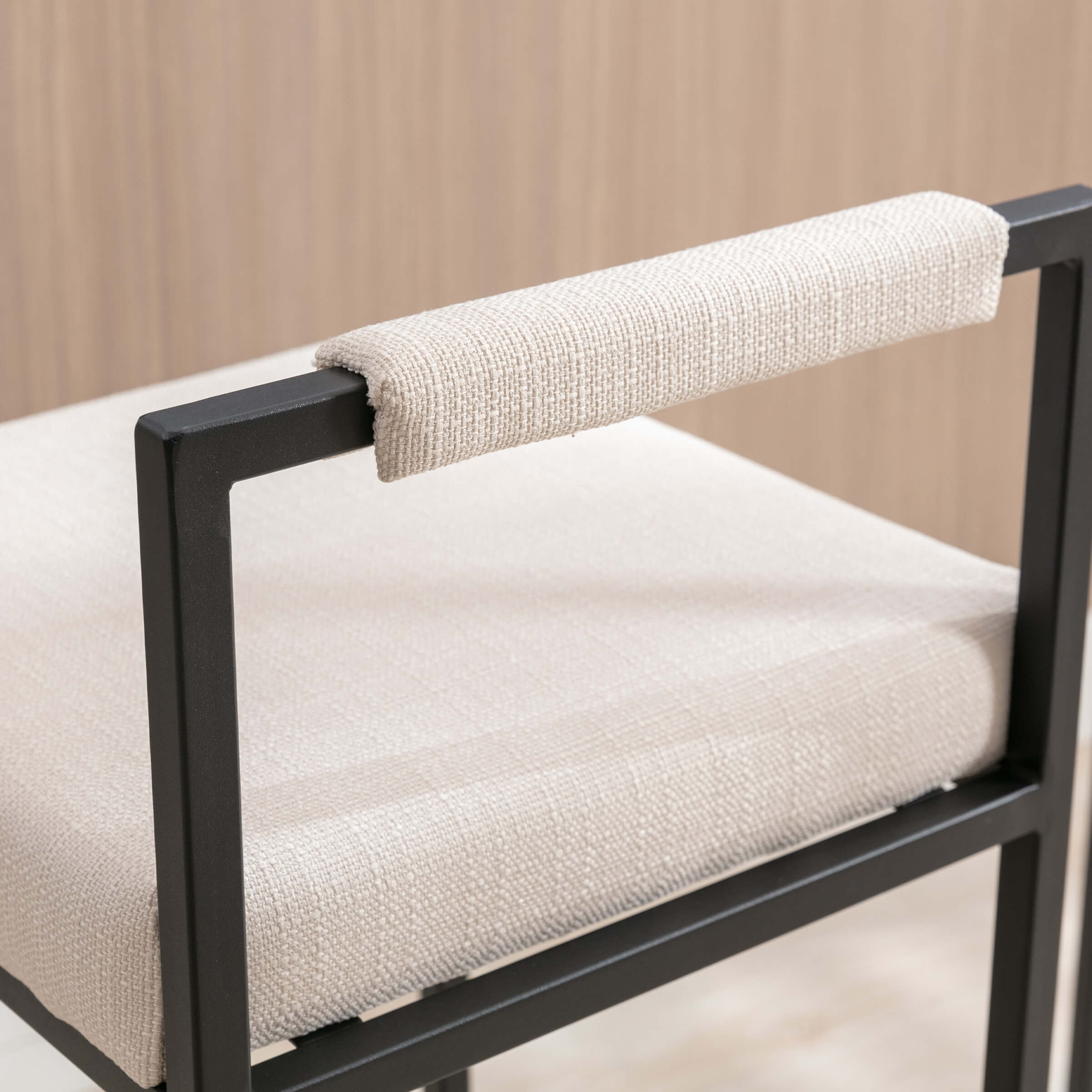 Close-up of front armrest and chair side