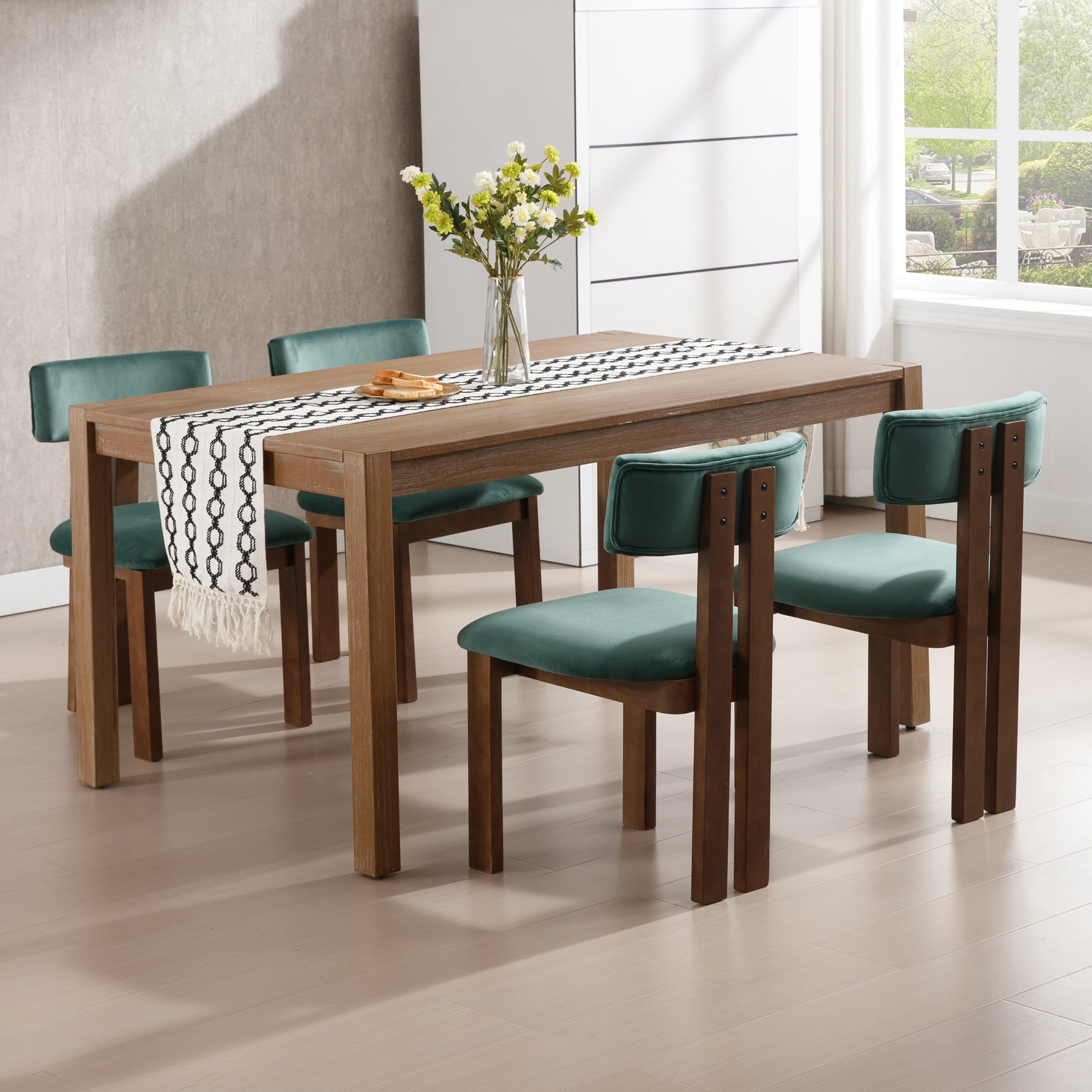 Teal/green chairs around table