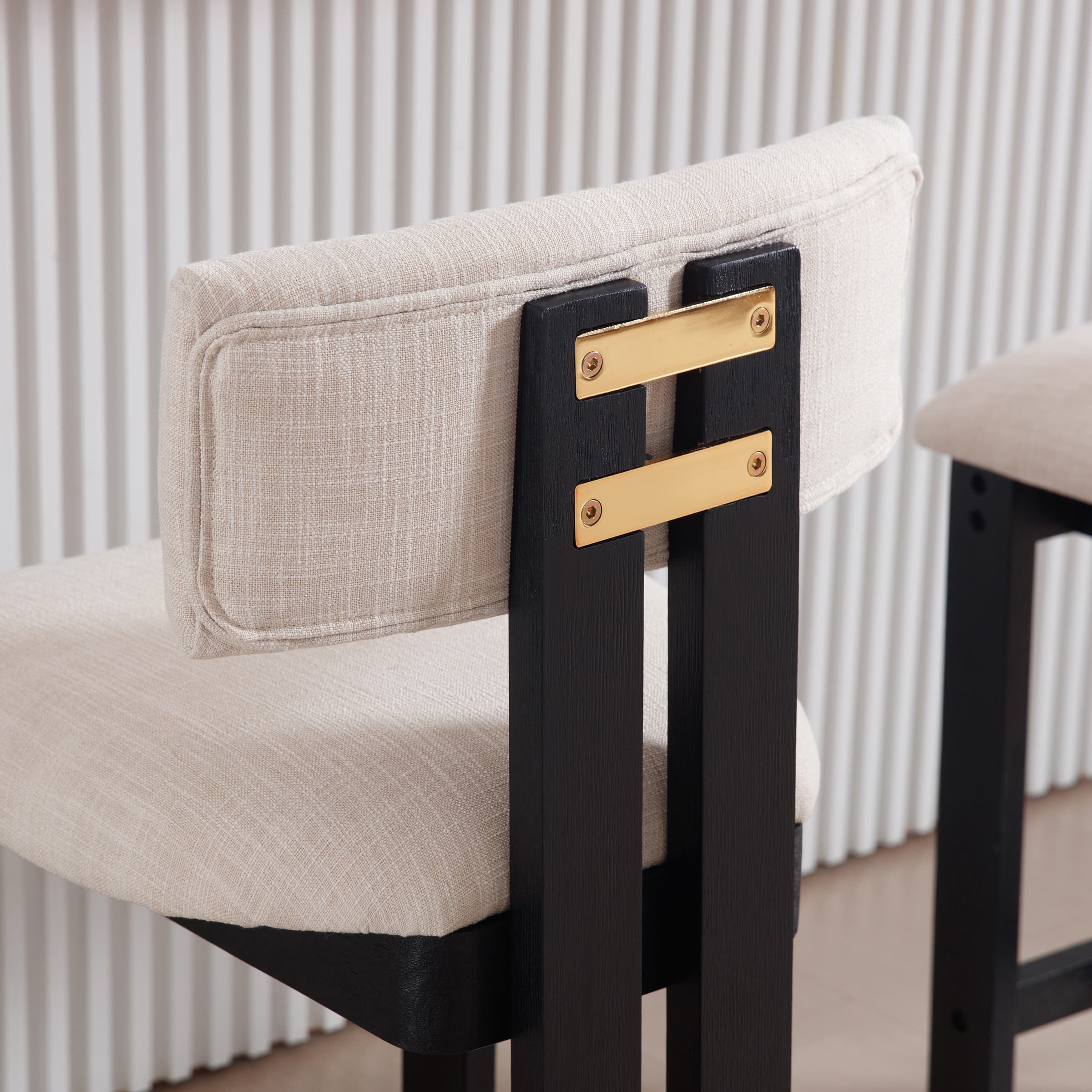 Back of stool showing black frame