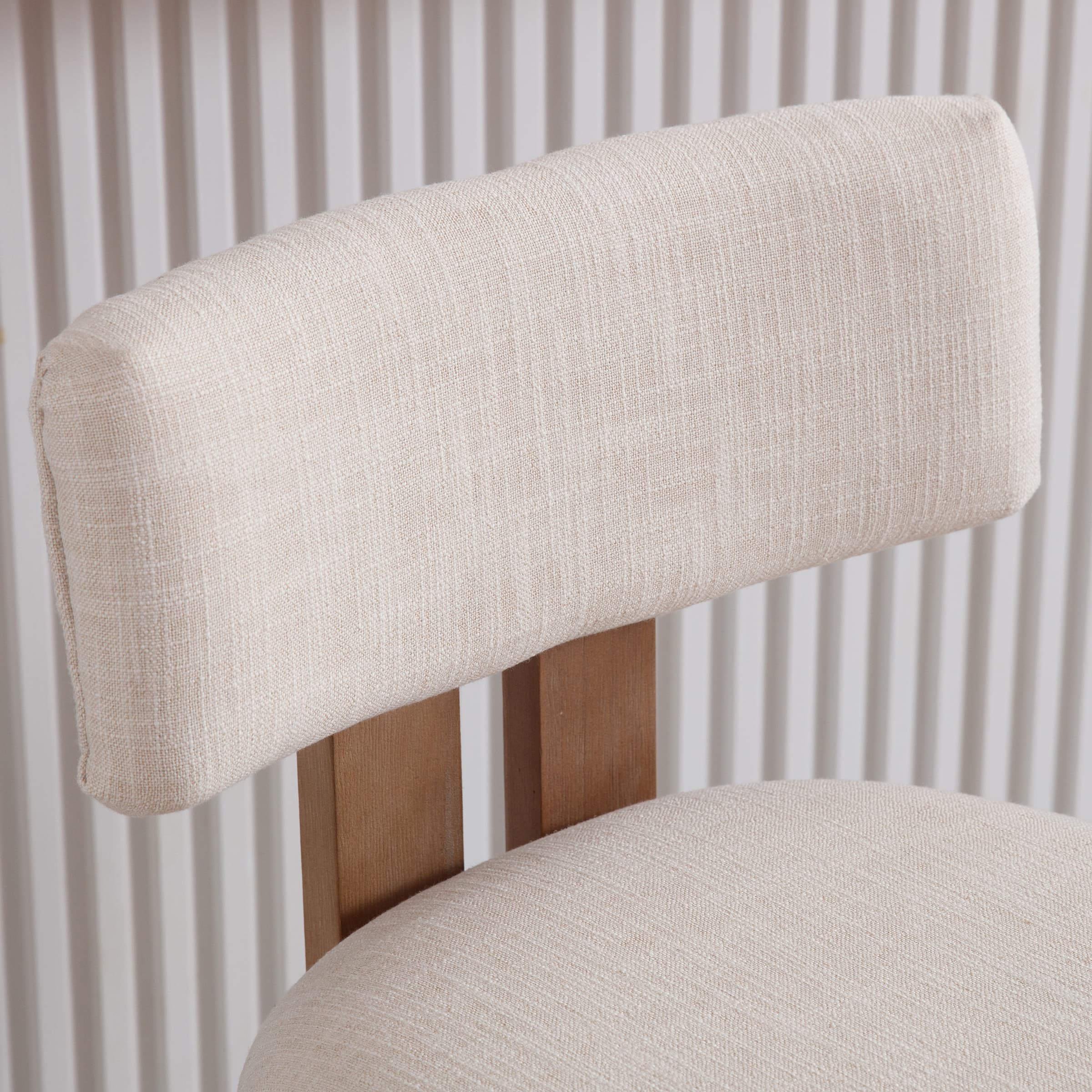 Beige backrest cushion close-up