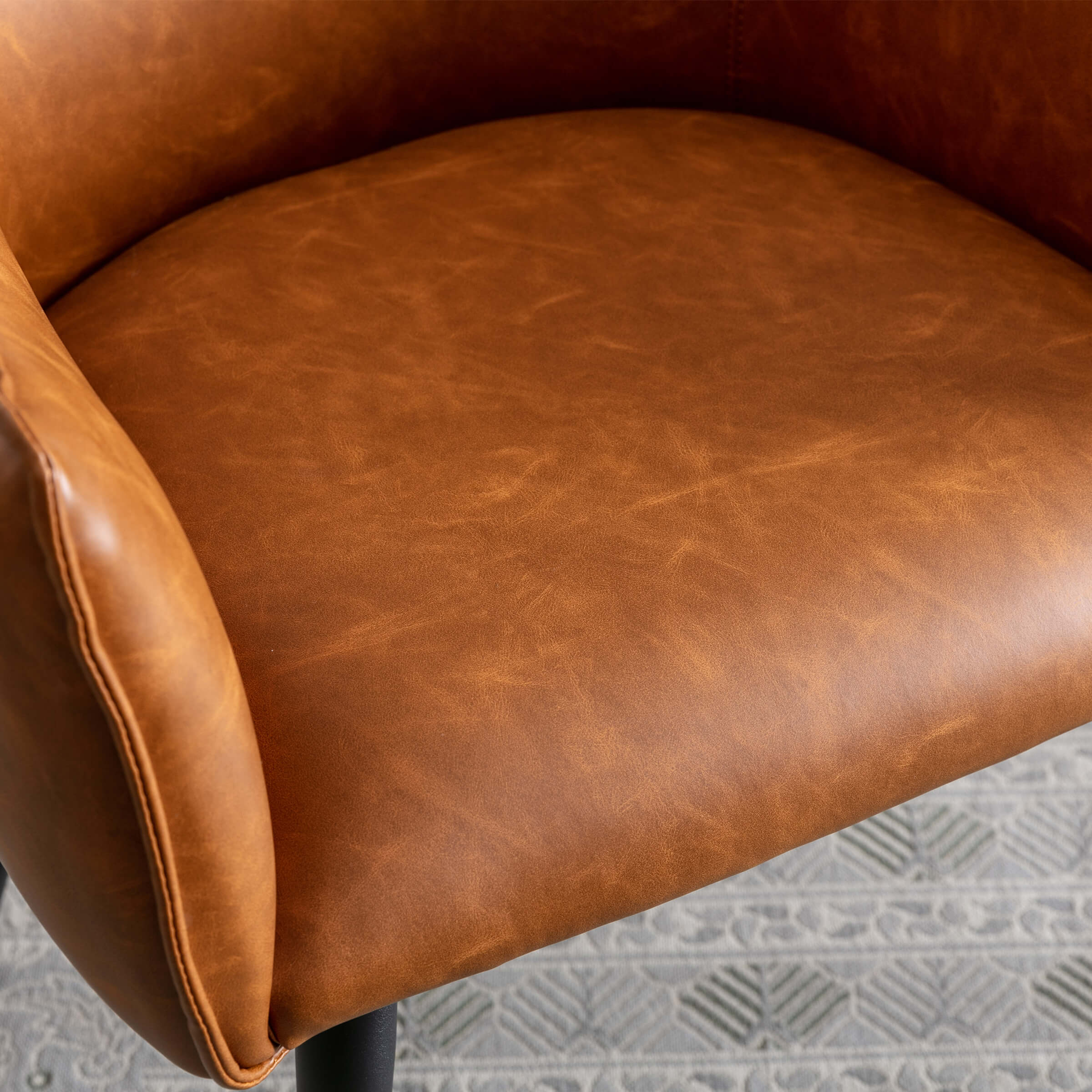 Close-up of brown PU leather seat cushion