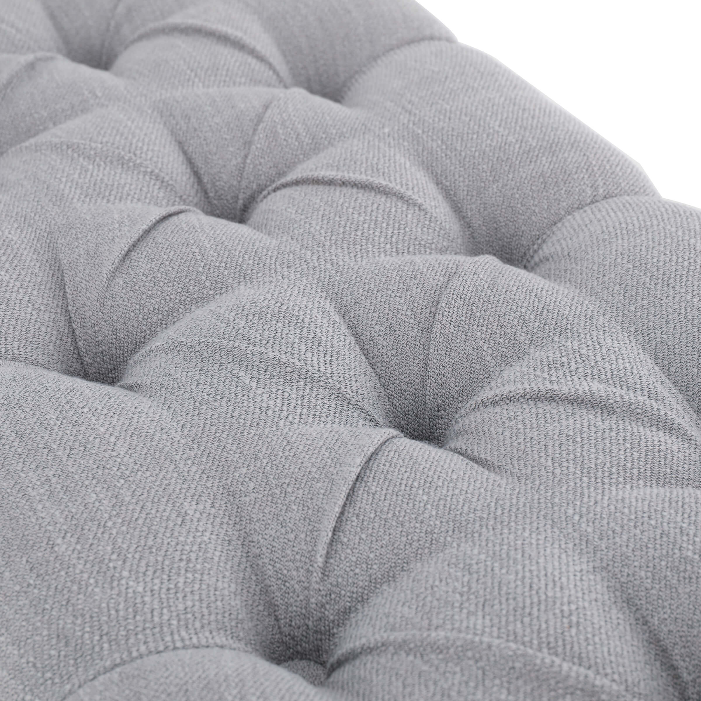 Close-up of tufted cushion detail