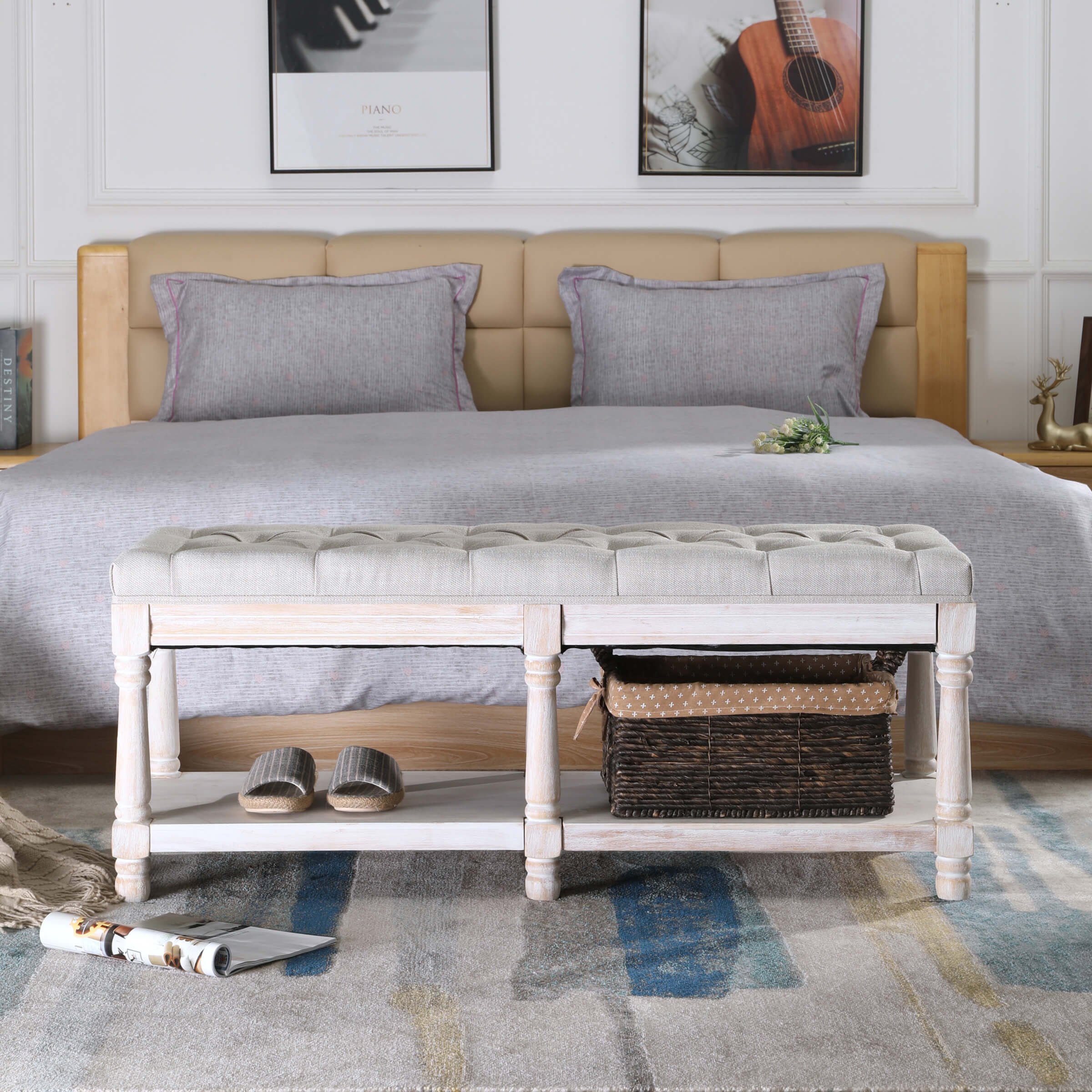 Tufted bench with books and cups