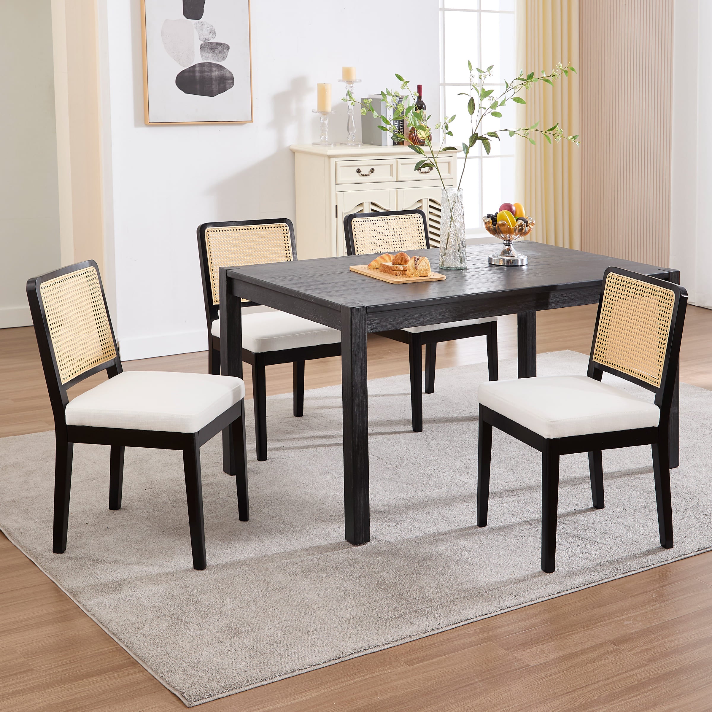 Dining set with table and four chairs in a dining room
