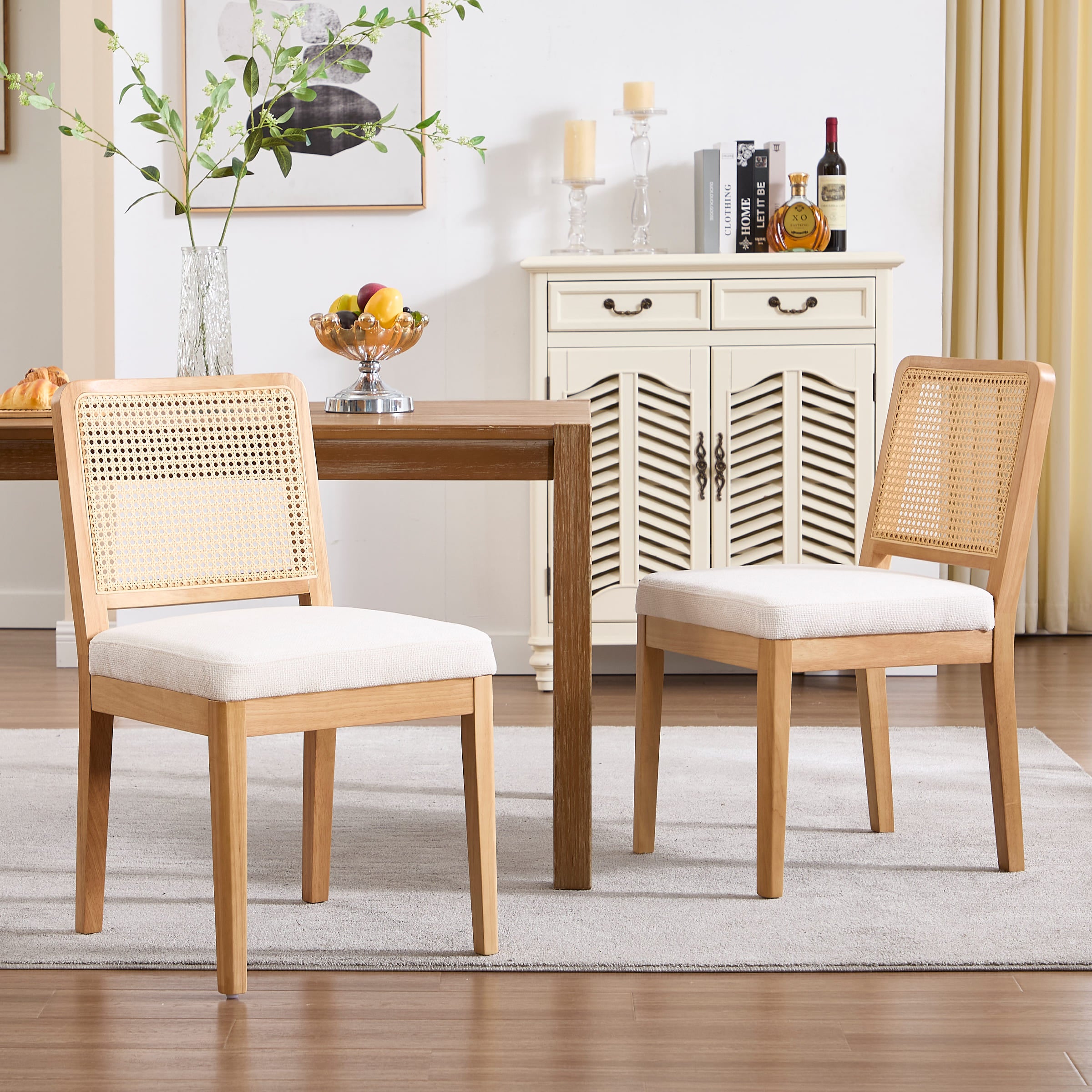 Two chairs around table in living room