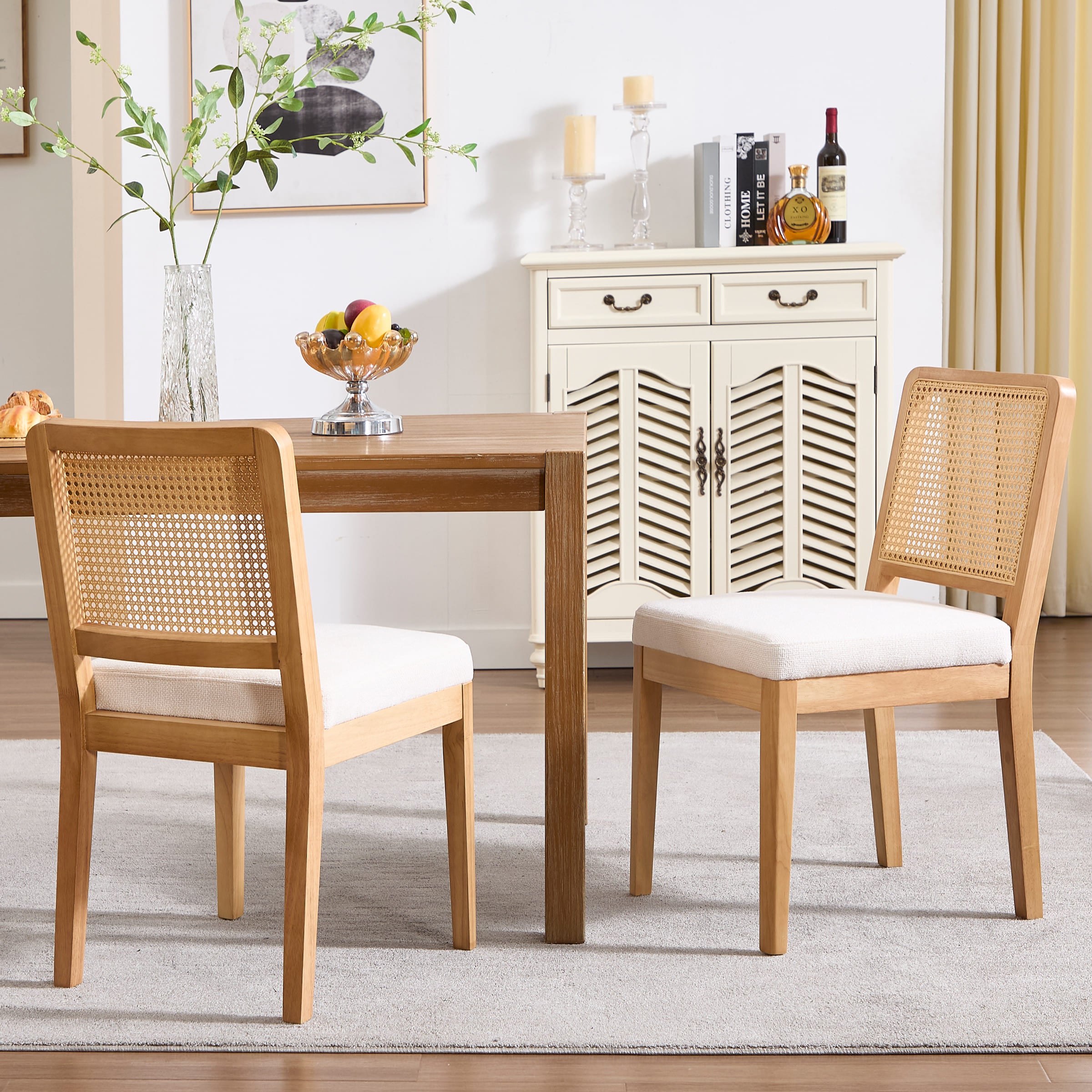 Two chairs around table in living room