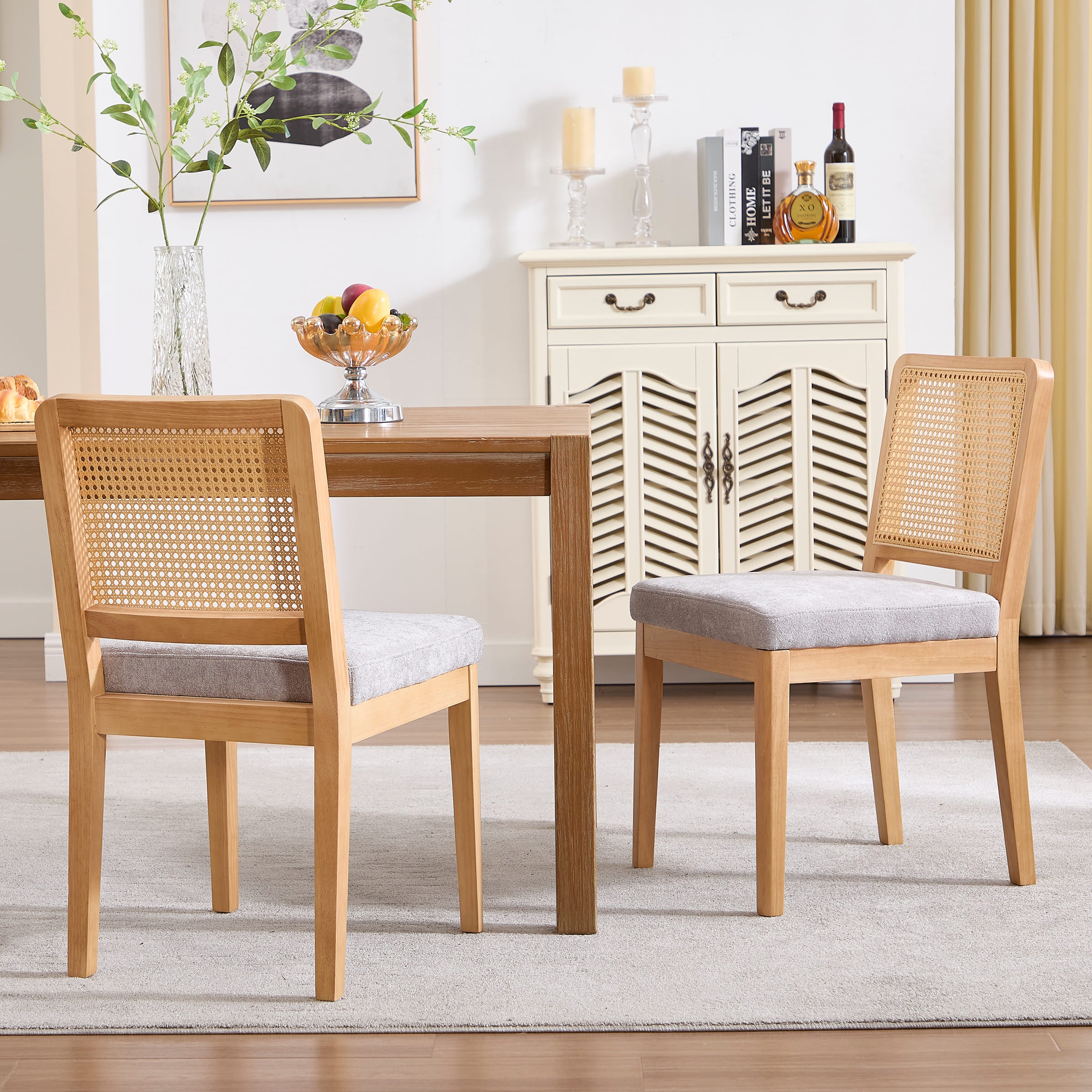 Two chairs around a table in a room