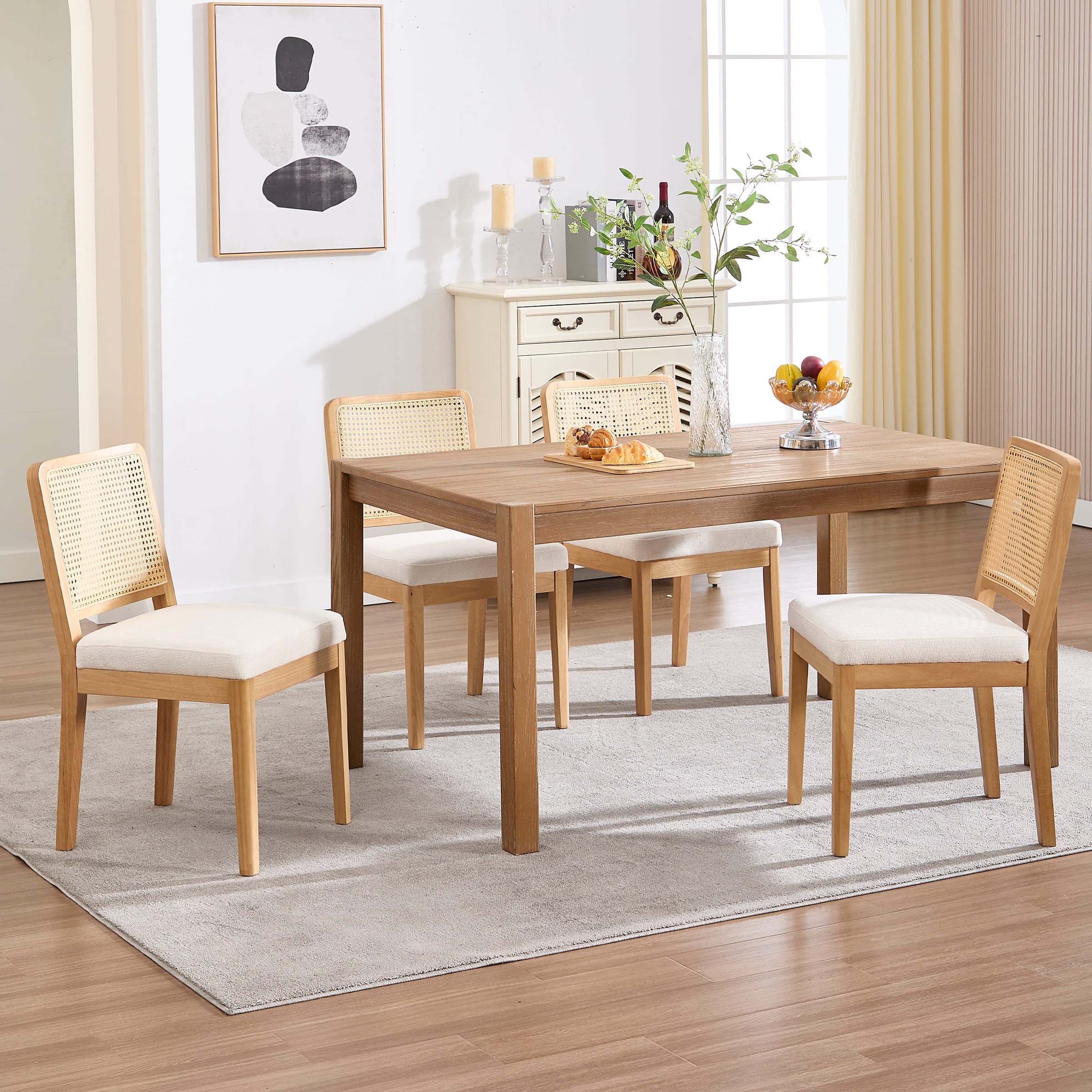 Dining table with four chairs in living room