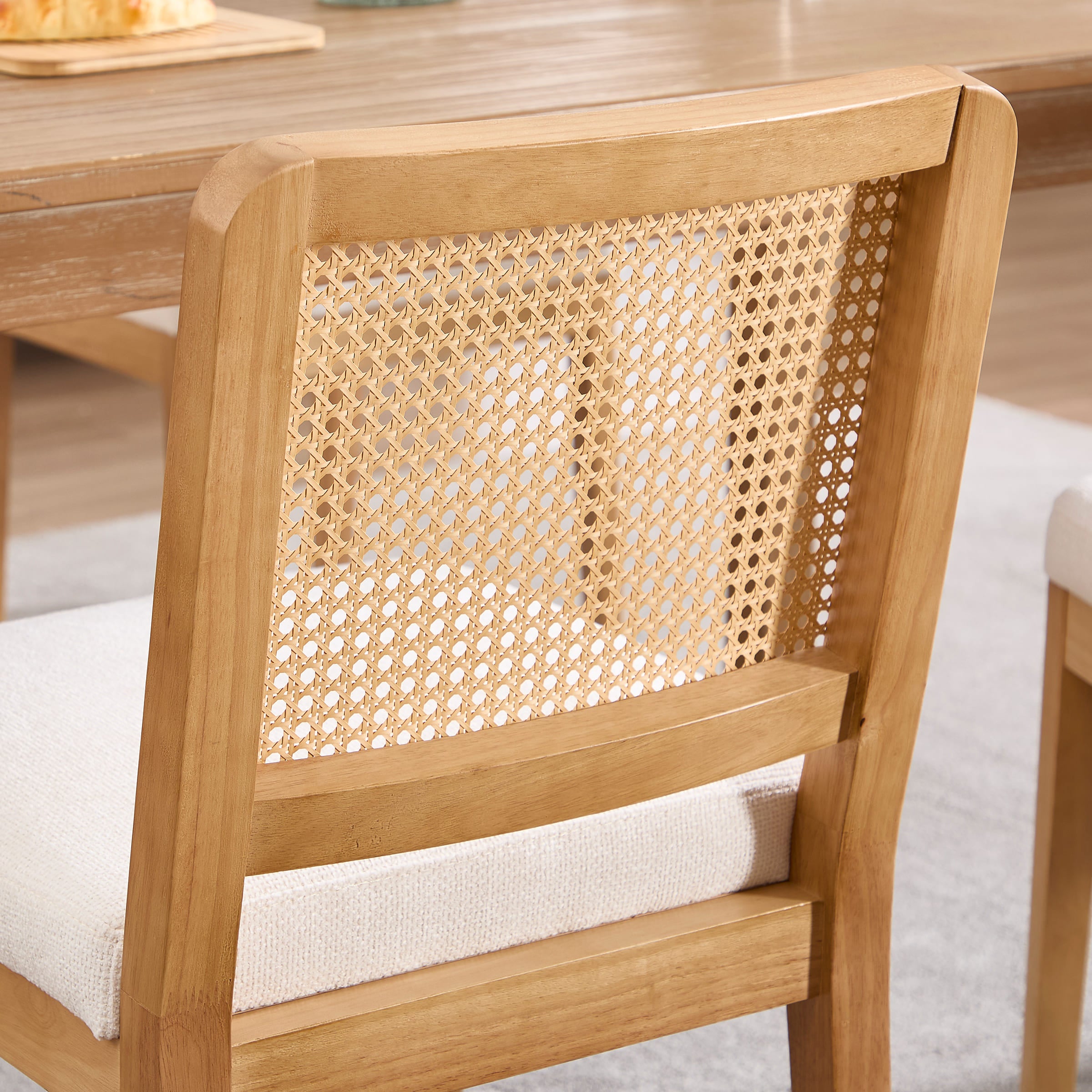Cane back and wood frame close-up