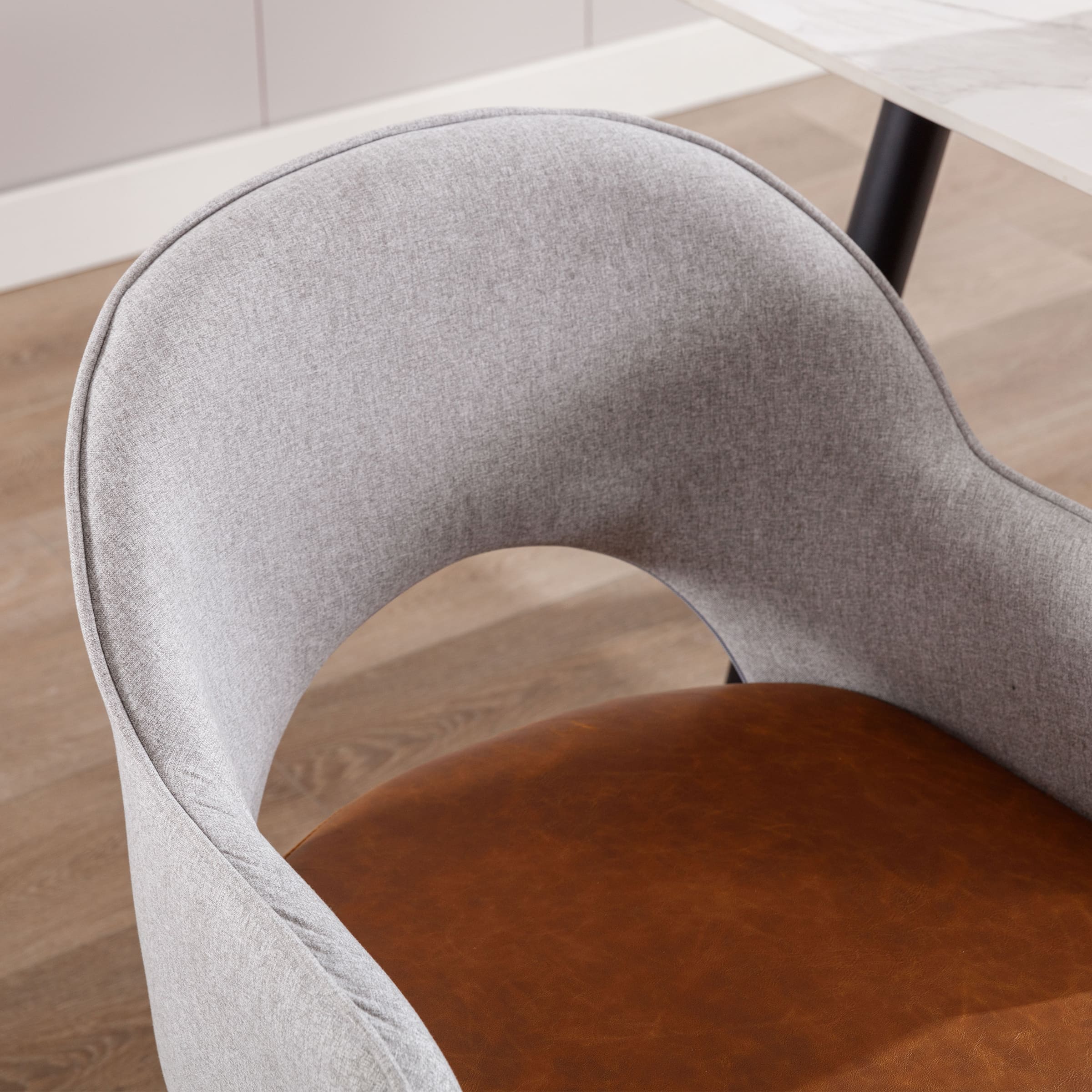 Grey fabric armchair back and side