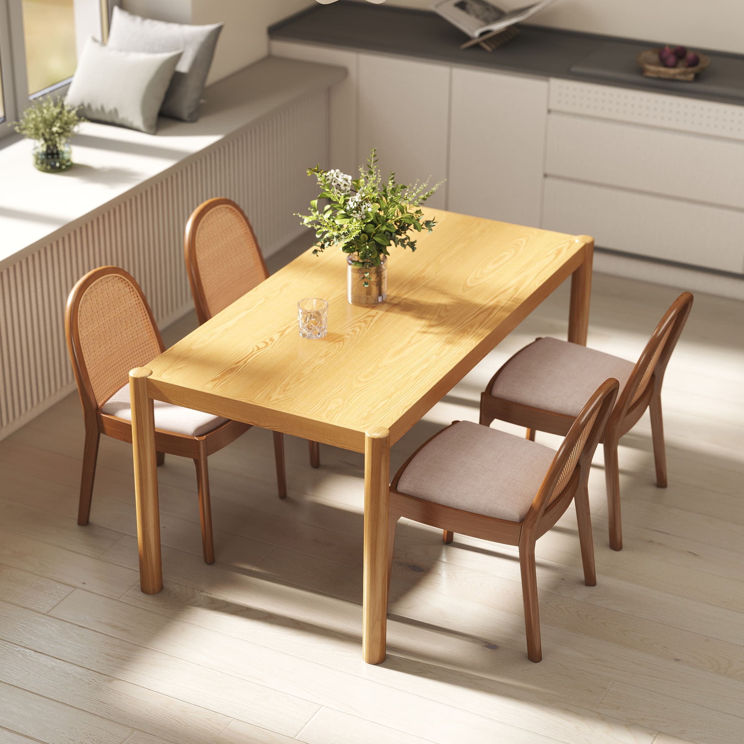 Wood dining table with four chairs around