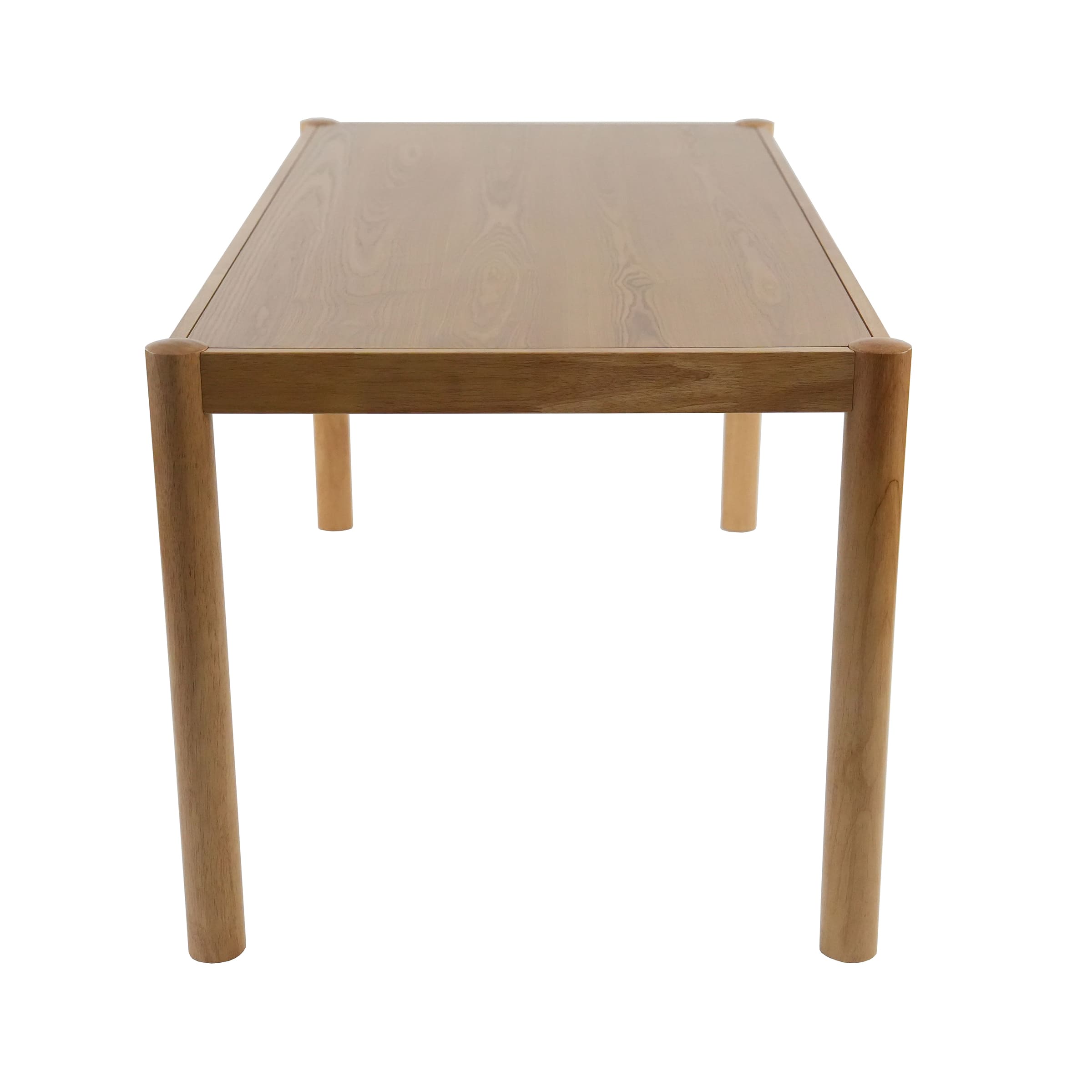 Low-angle view of table showing top and legs