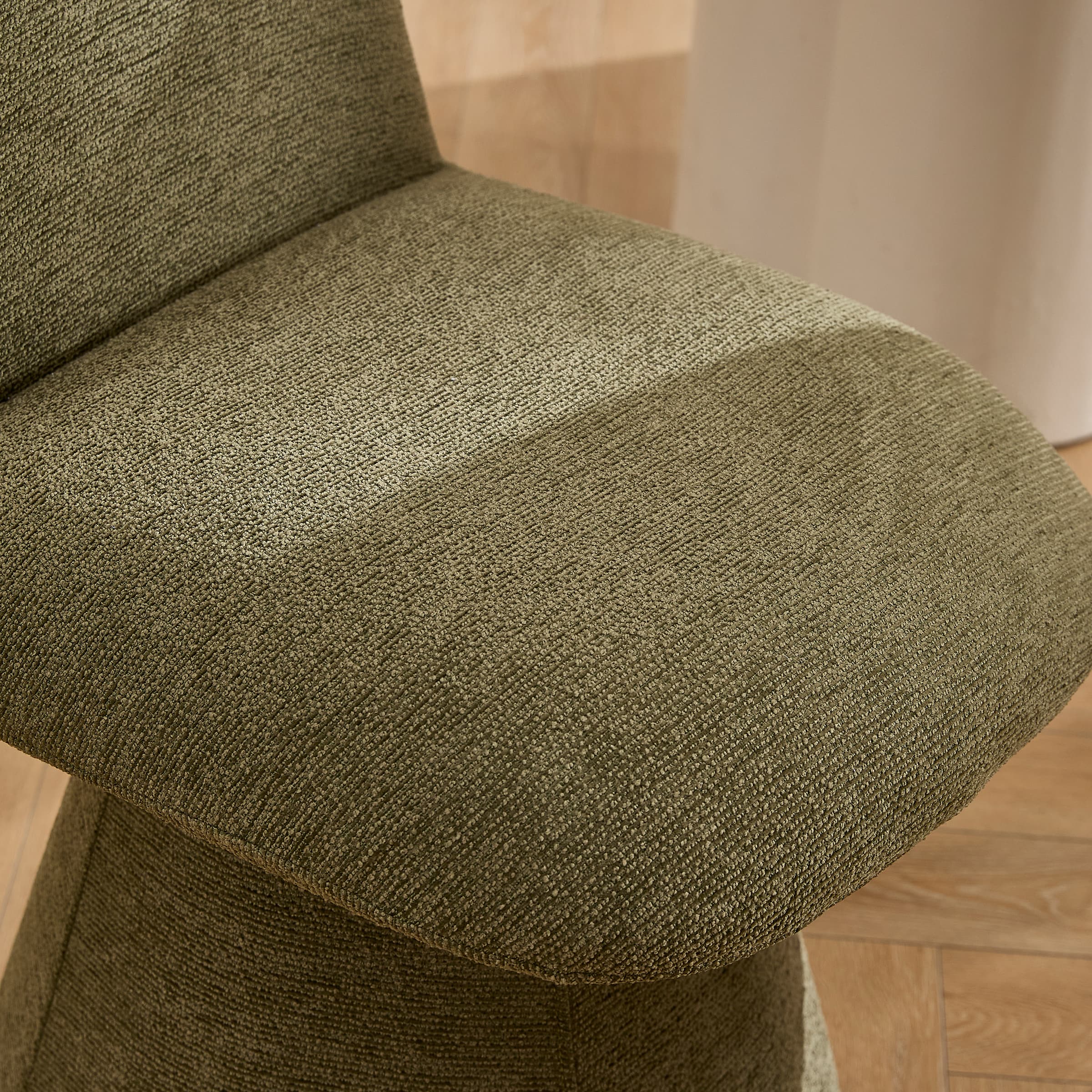 Fabric texture close-up of chair seat edge