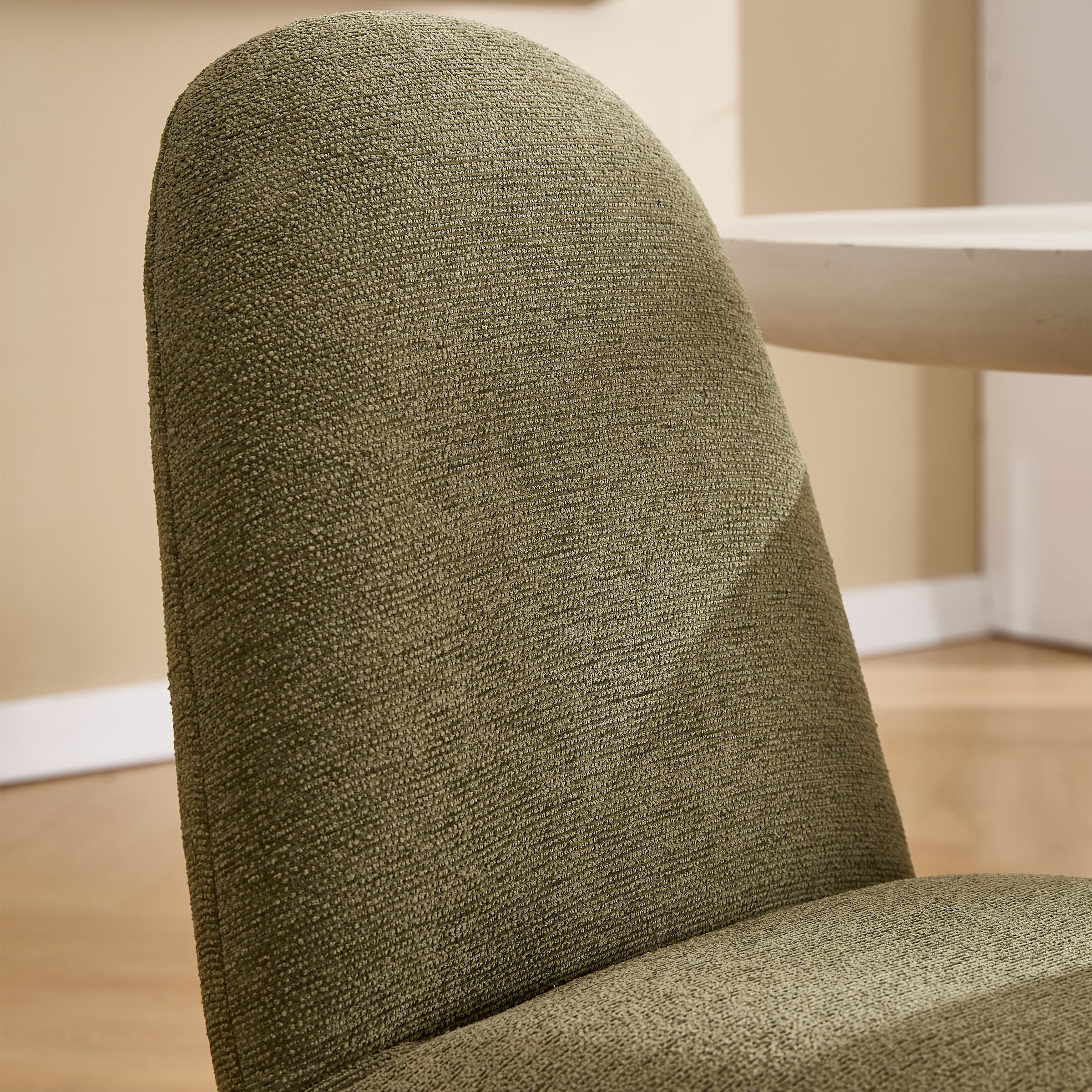 Close-up of chair back face showing fabric texture