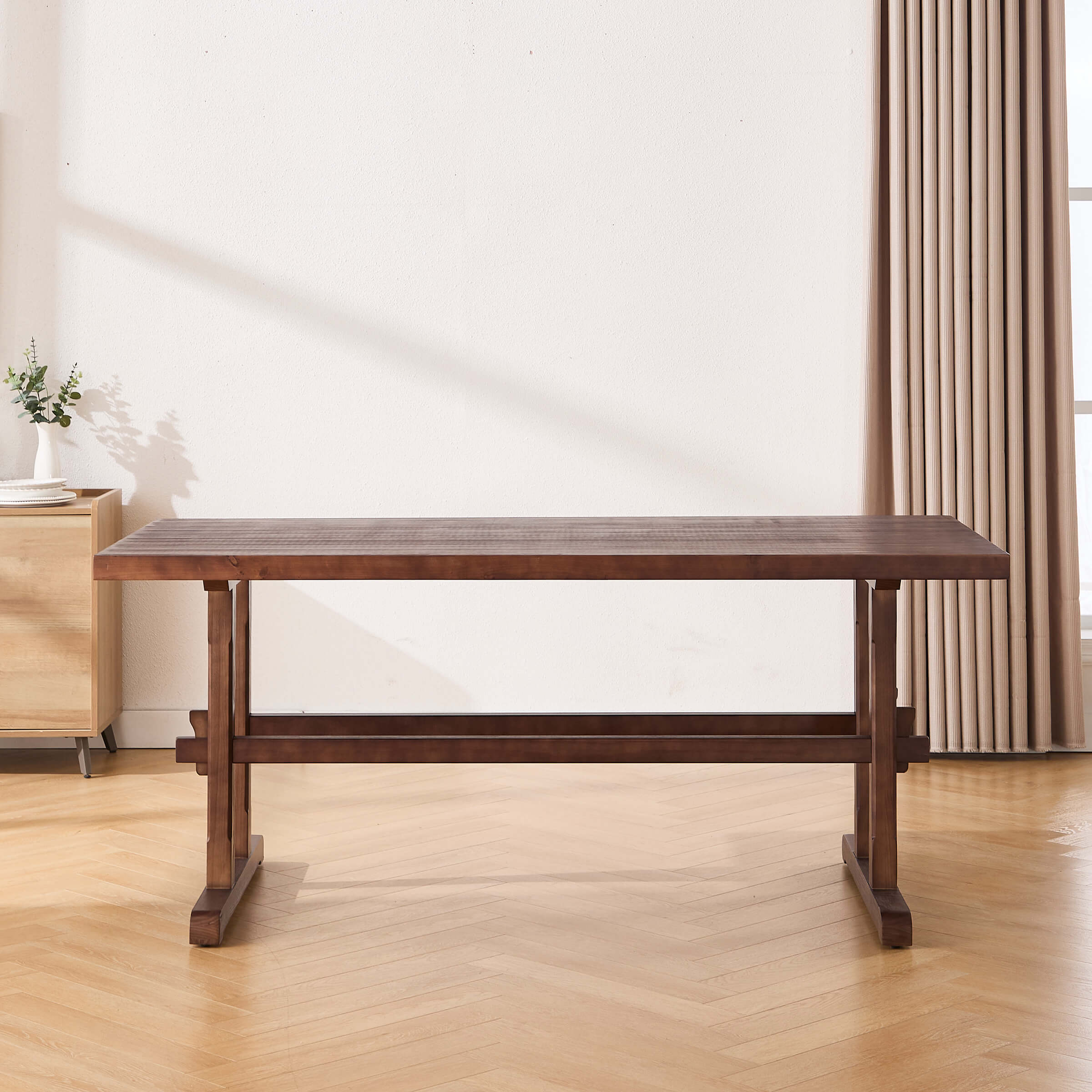 Dark wood dining table with chairs around