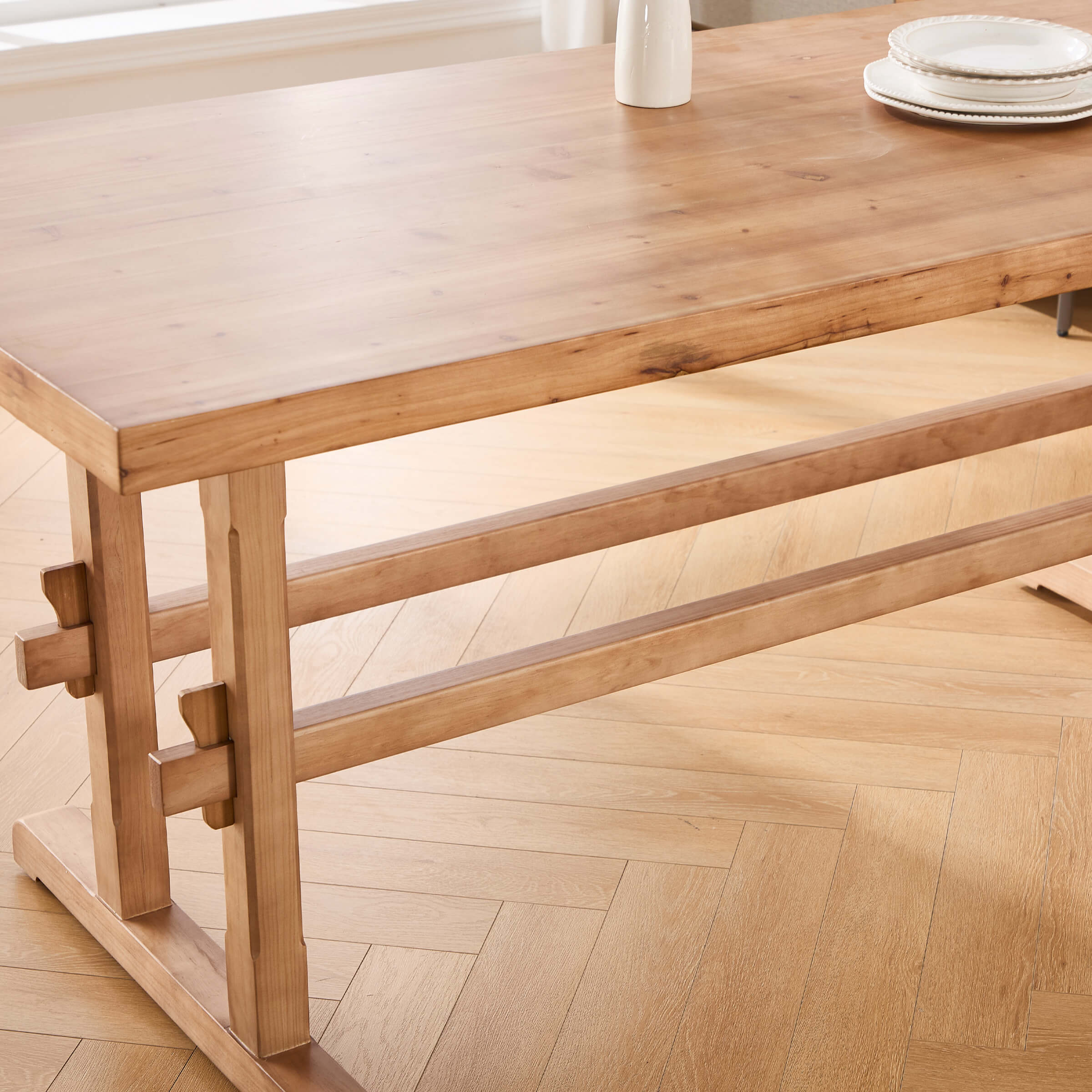 Edge and corner of wooden table showing joinery