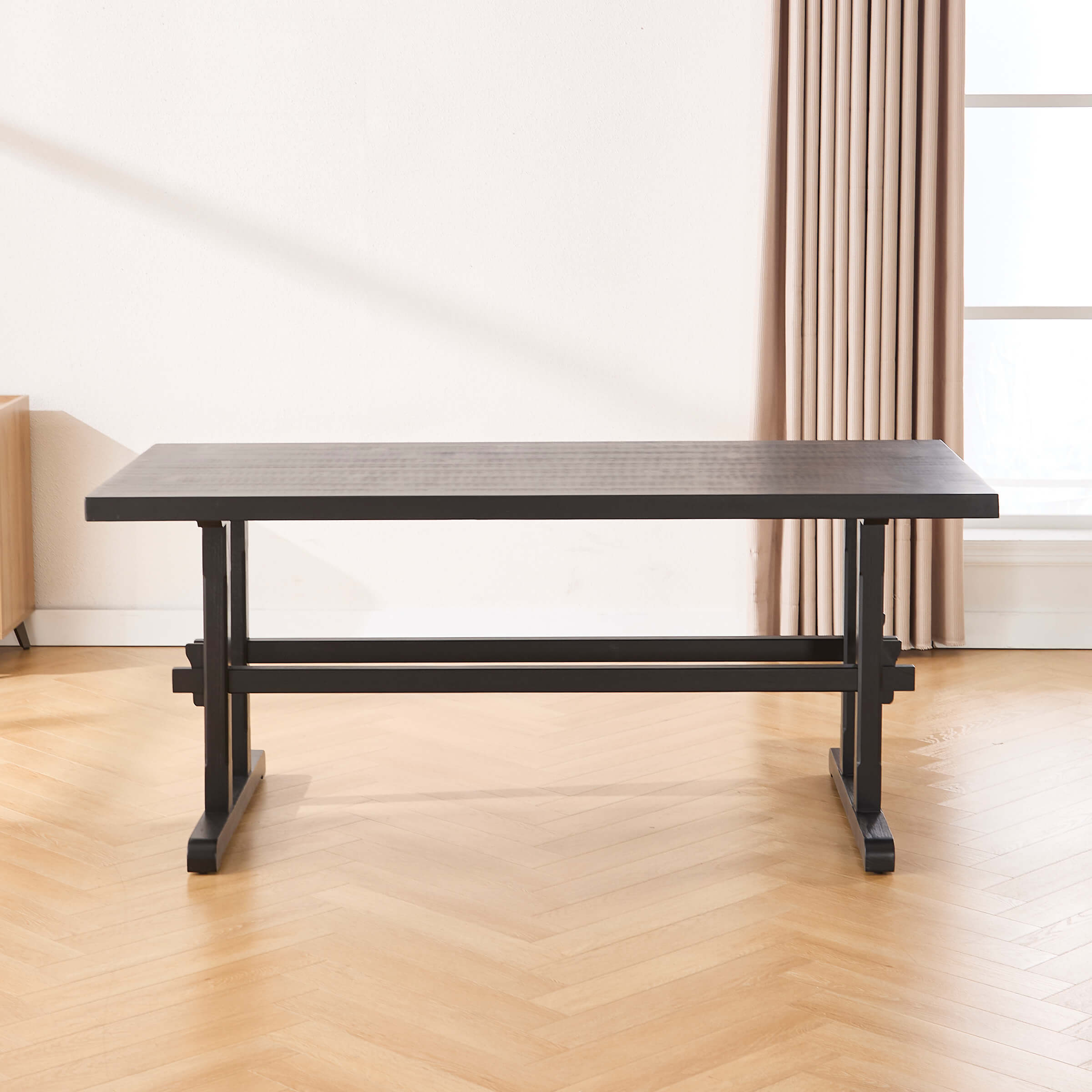 Dark wood dining table with four chairs