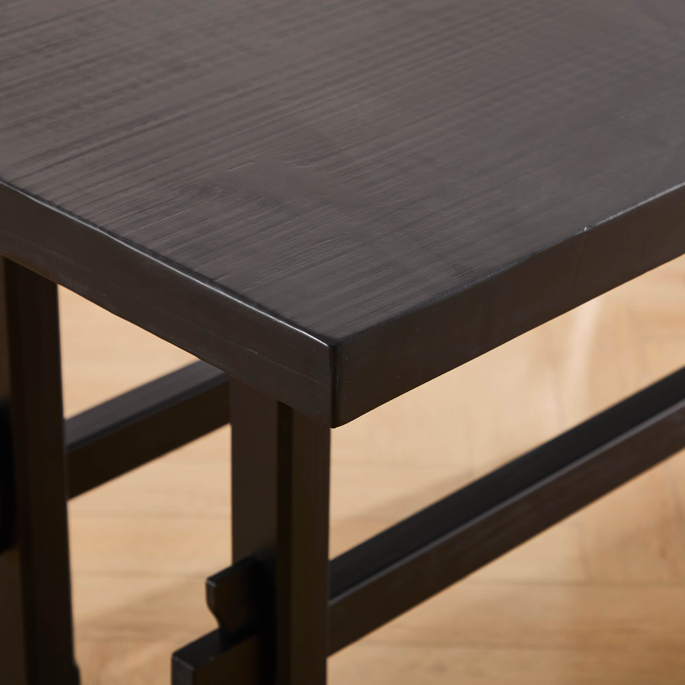 Close-up of table surface showing wood grain
