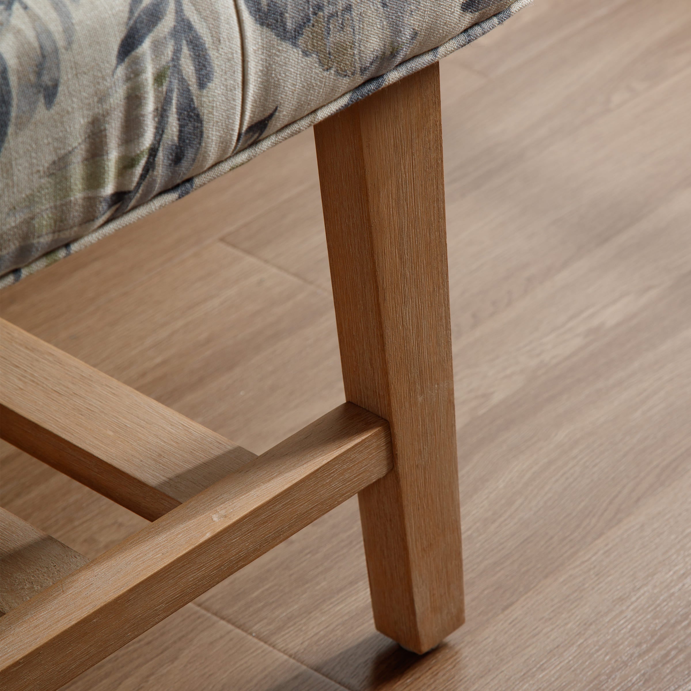Close-up of wooden leg joinery on a bench