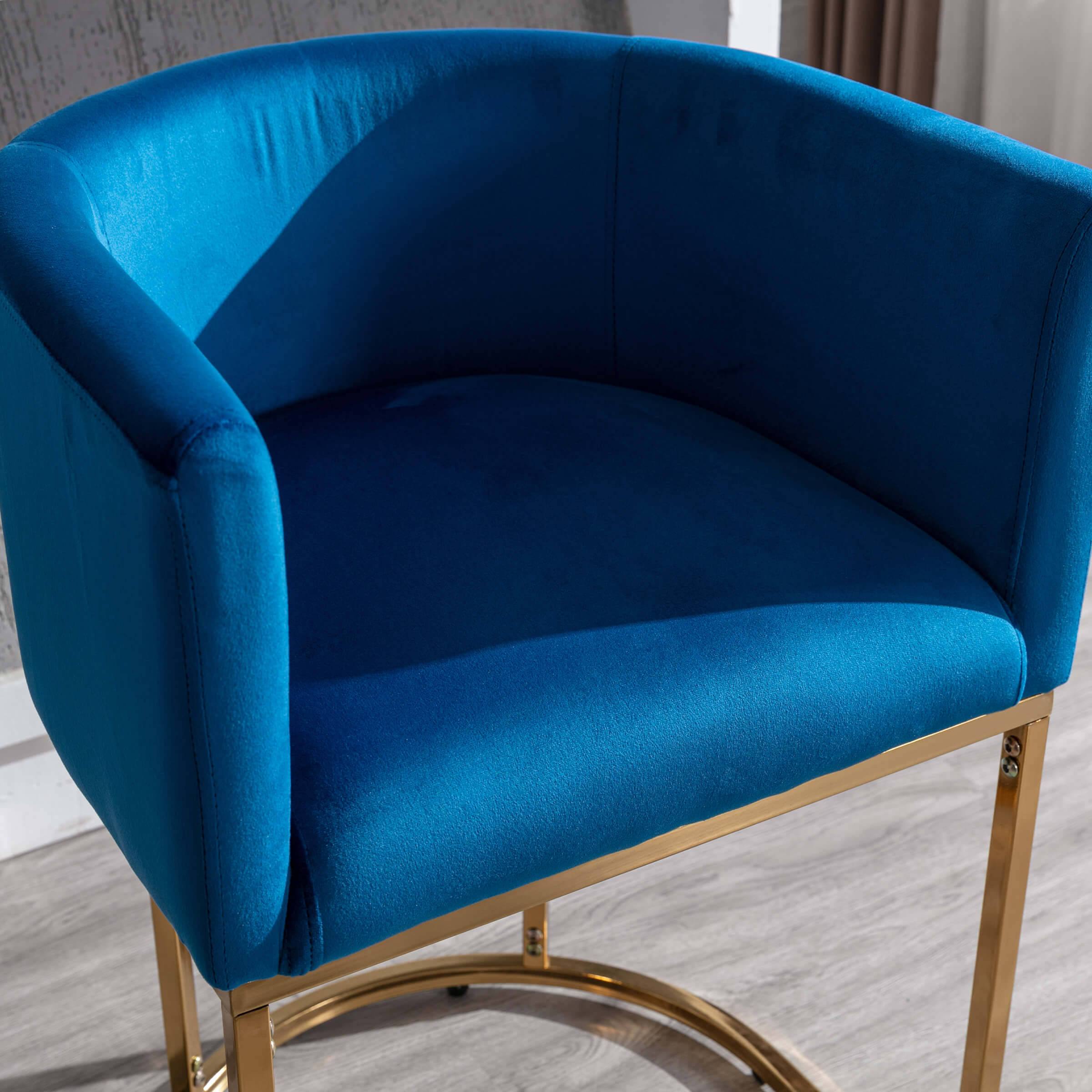 Close-up of golden base and upholstery