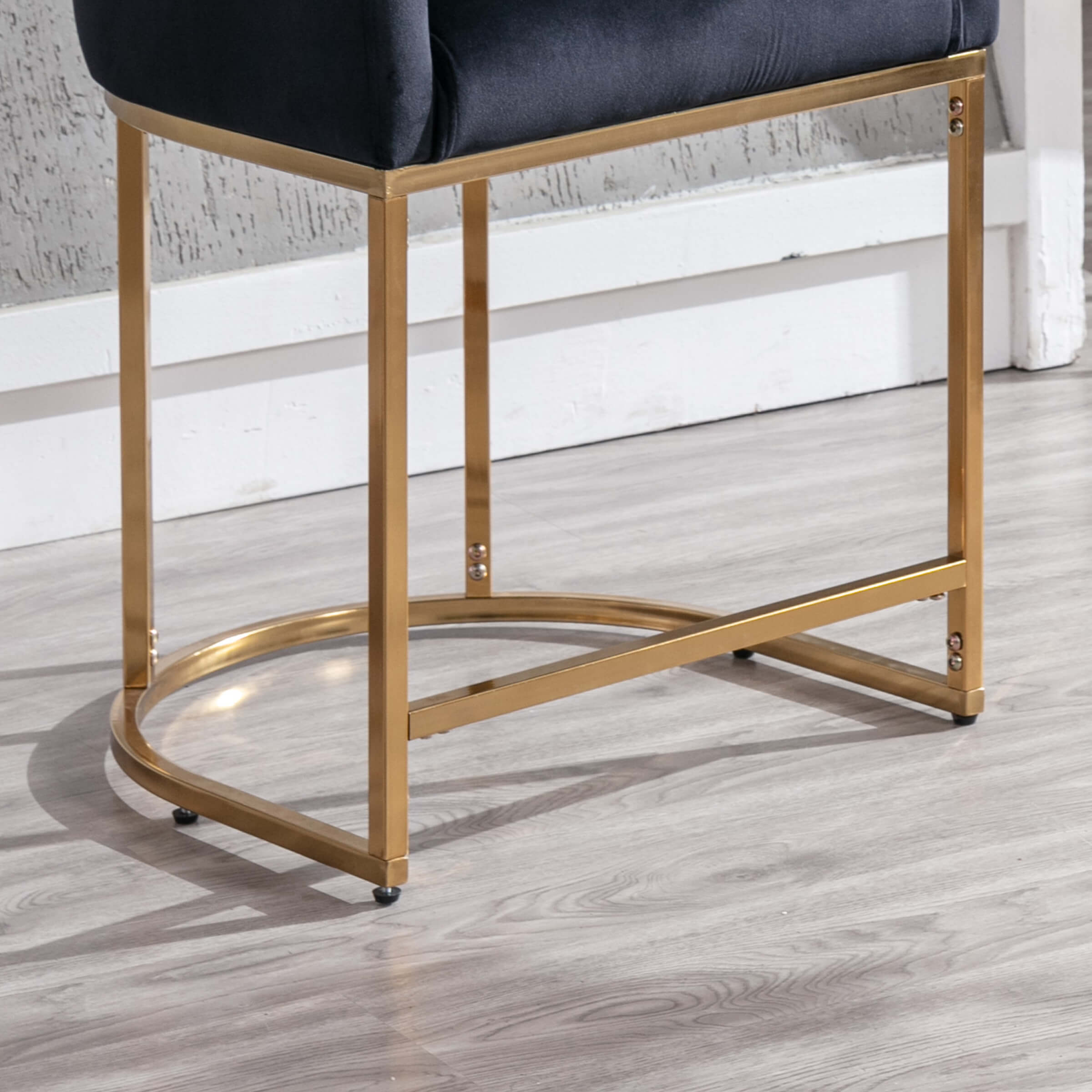 Circular gold base with straight legs