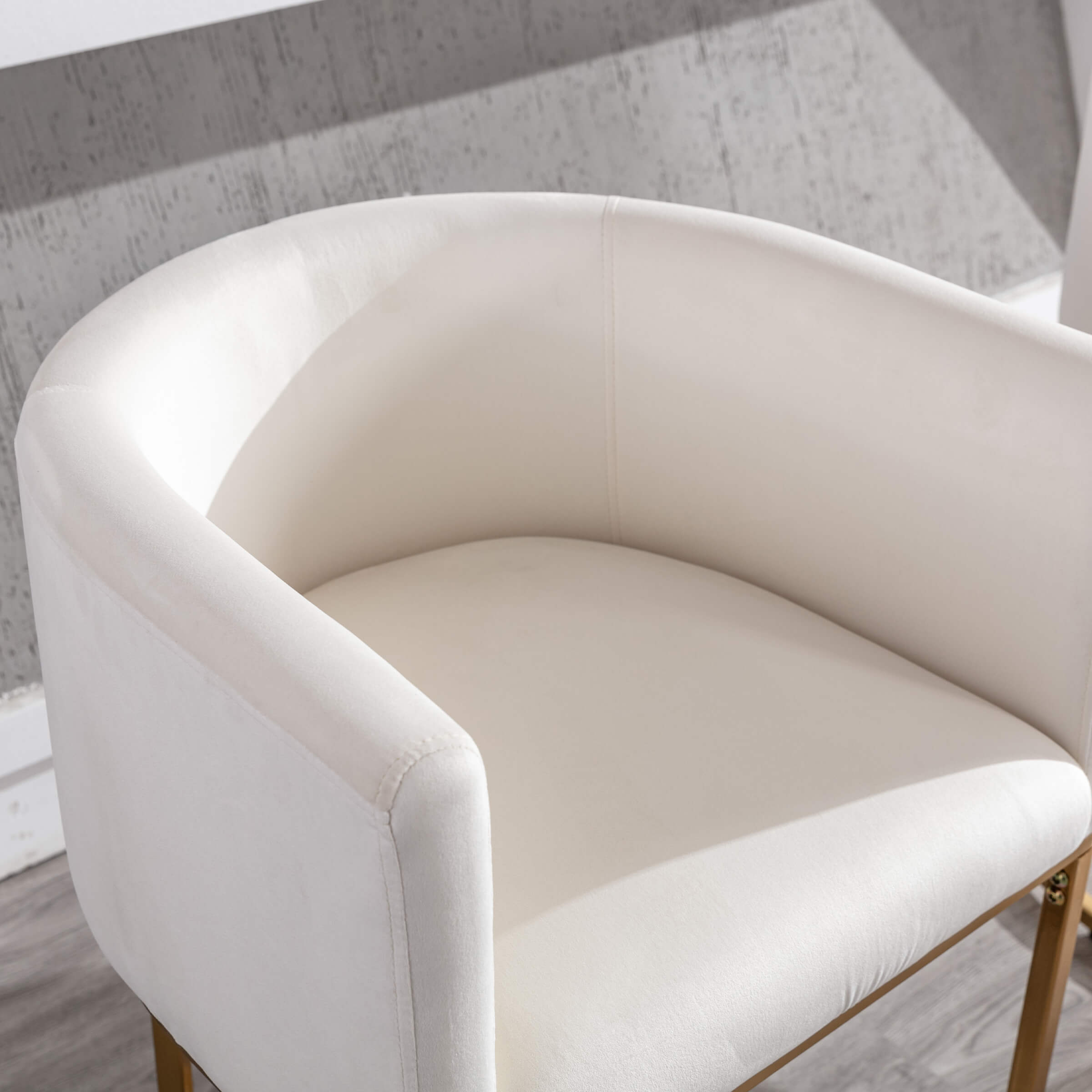 Close-up of chair arm and upholstery
