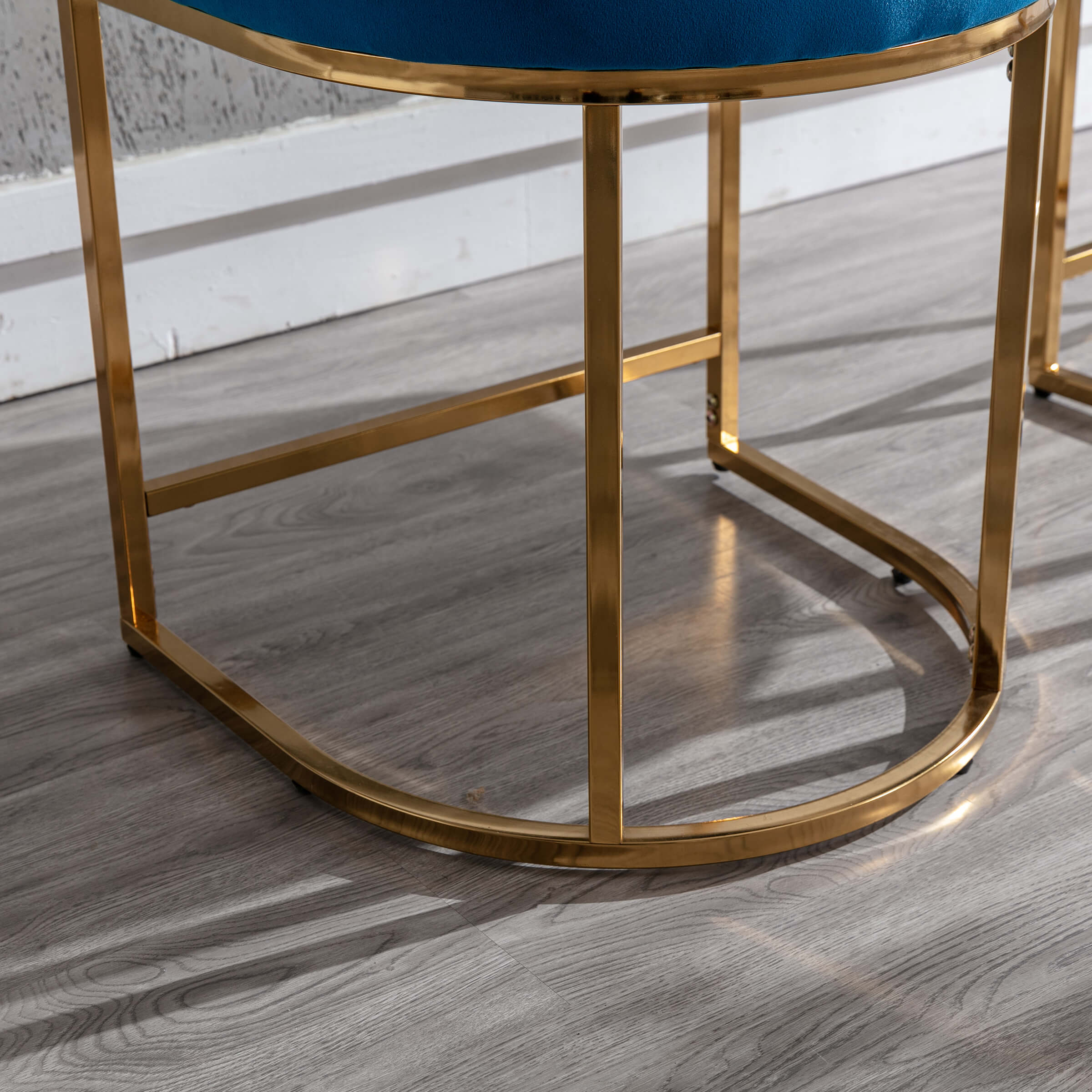 Blue velvet chair base detail