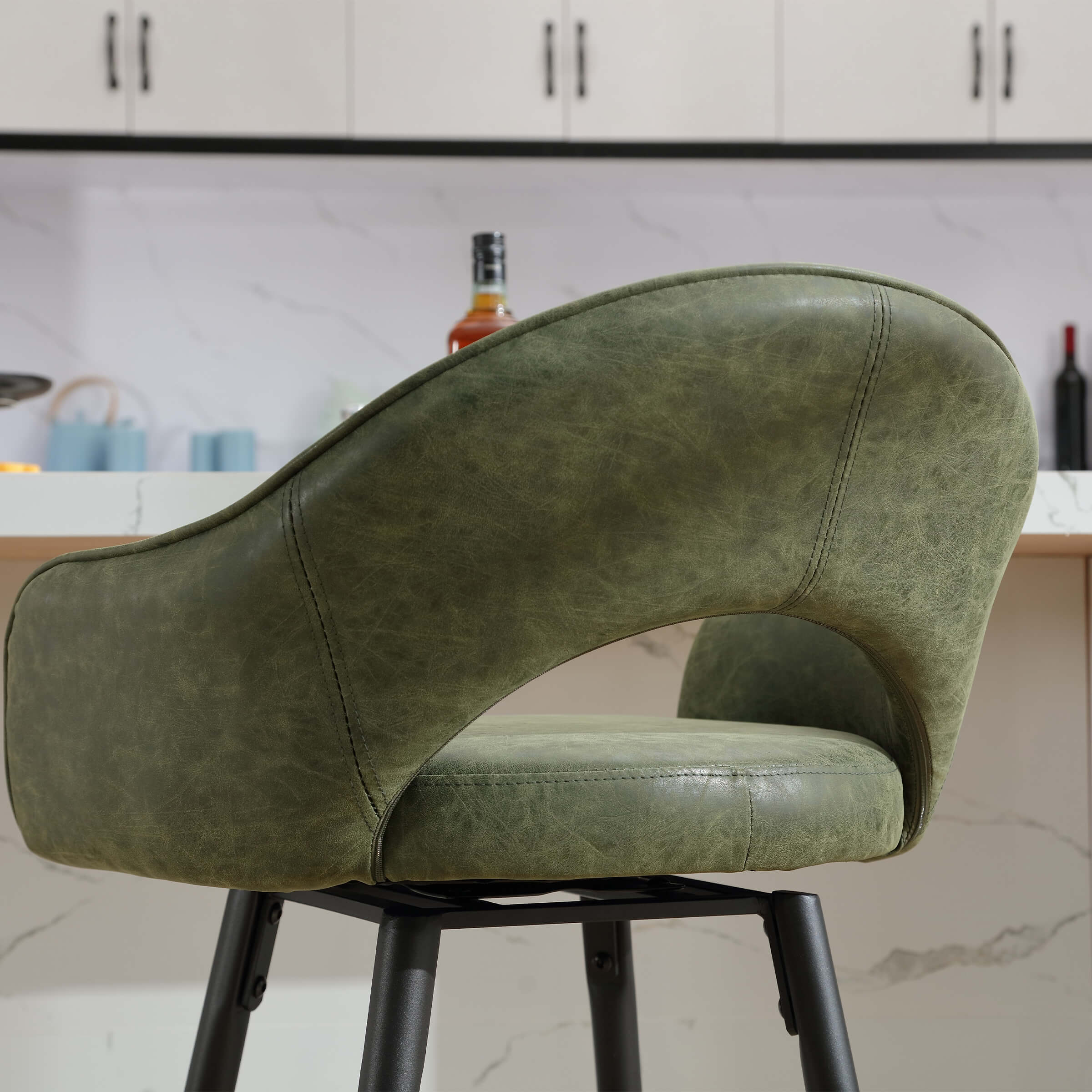 Green chairs in kitchen