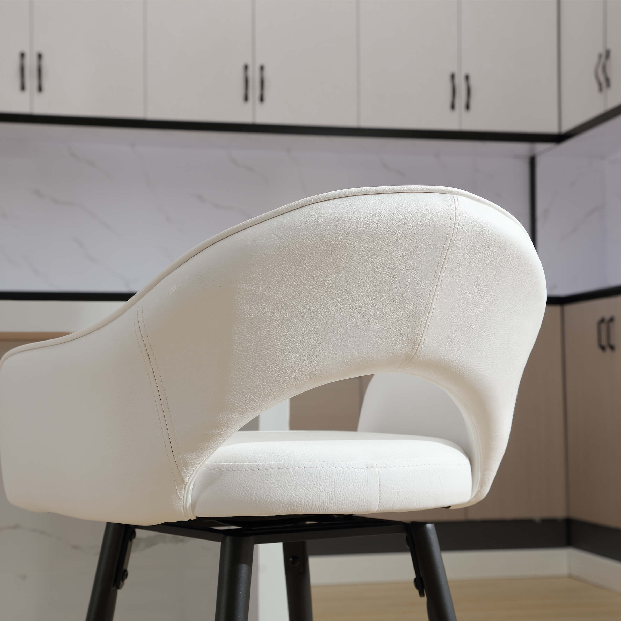 Side view of stool with back curved