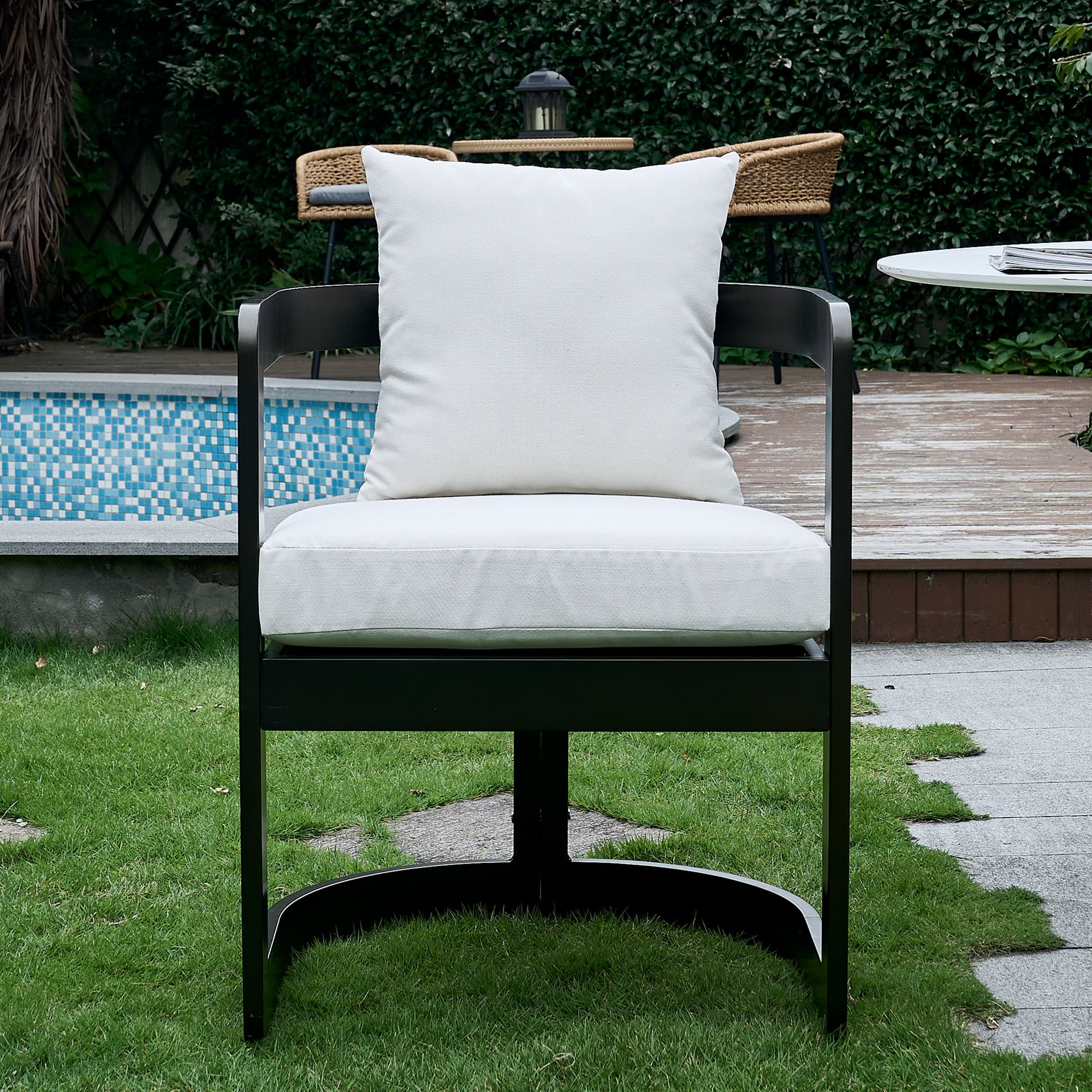 Close-up of chair–white cushion and black frame