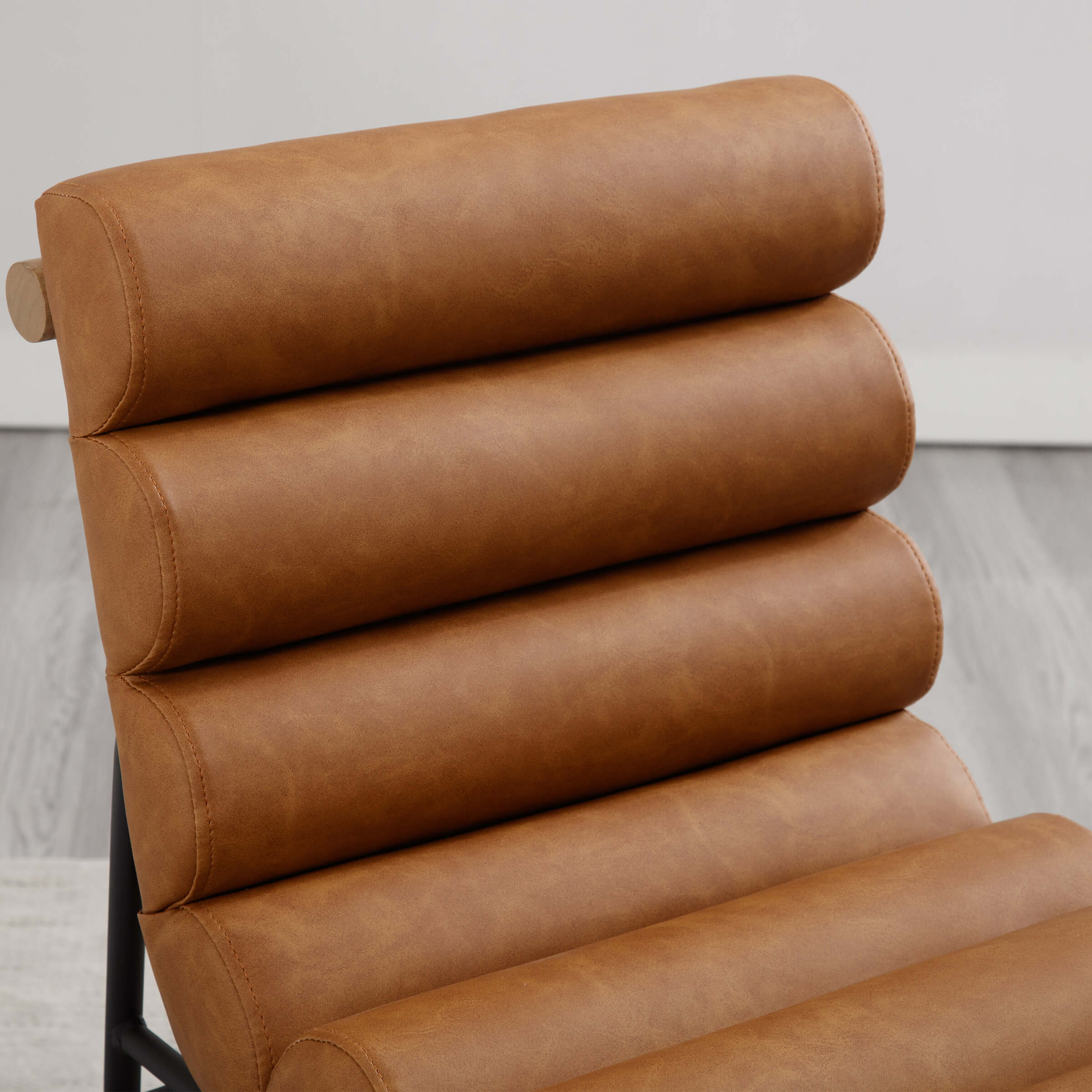 Close-up of wooden dowel at stool end cap