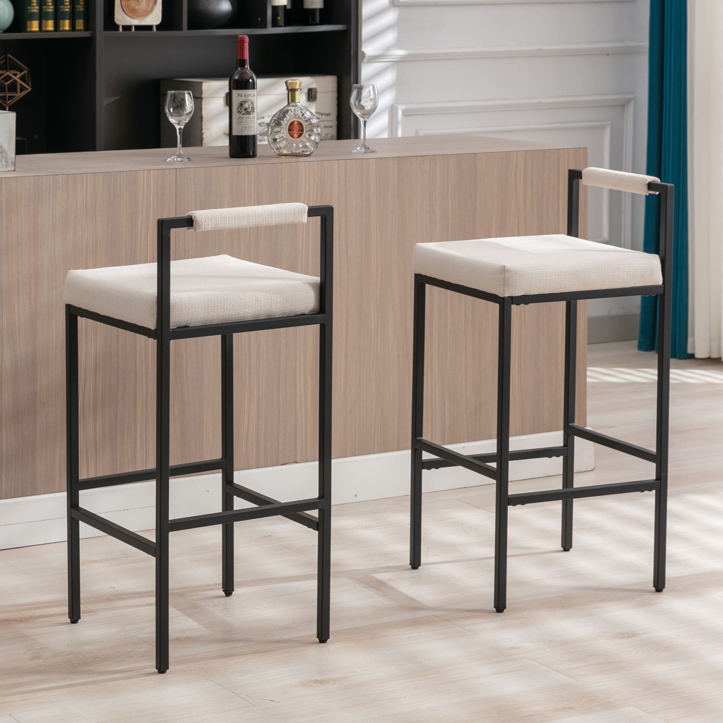Two bar stools at a bar counter in a stylish interior